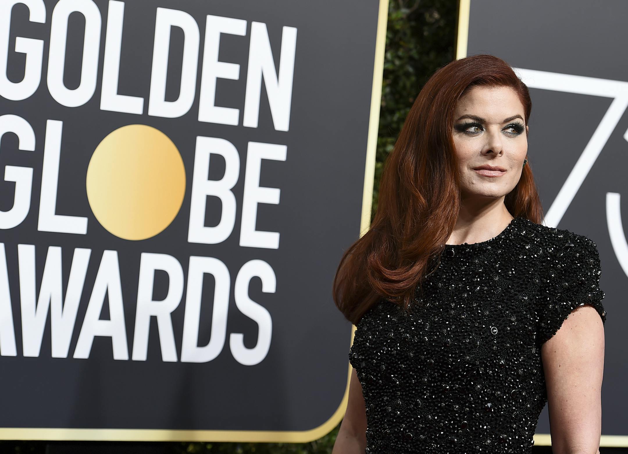 Debra Messing arrives at the 75th annual Golden Globe Awards at the Beverly Hilton Hotel on Sunday, Jan. 7, 2018, in Beverly Hills, Calif. (Photo by Jordan Strauss/Invision/AP)