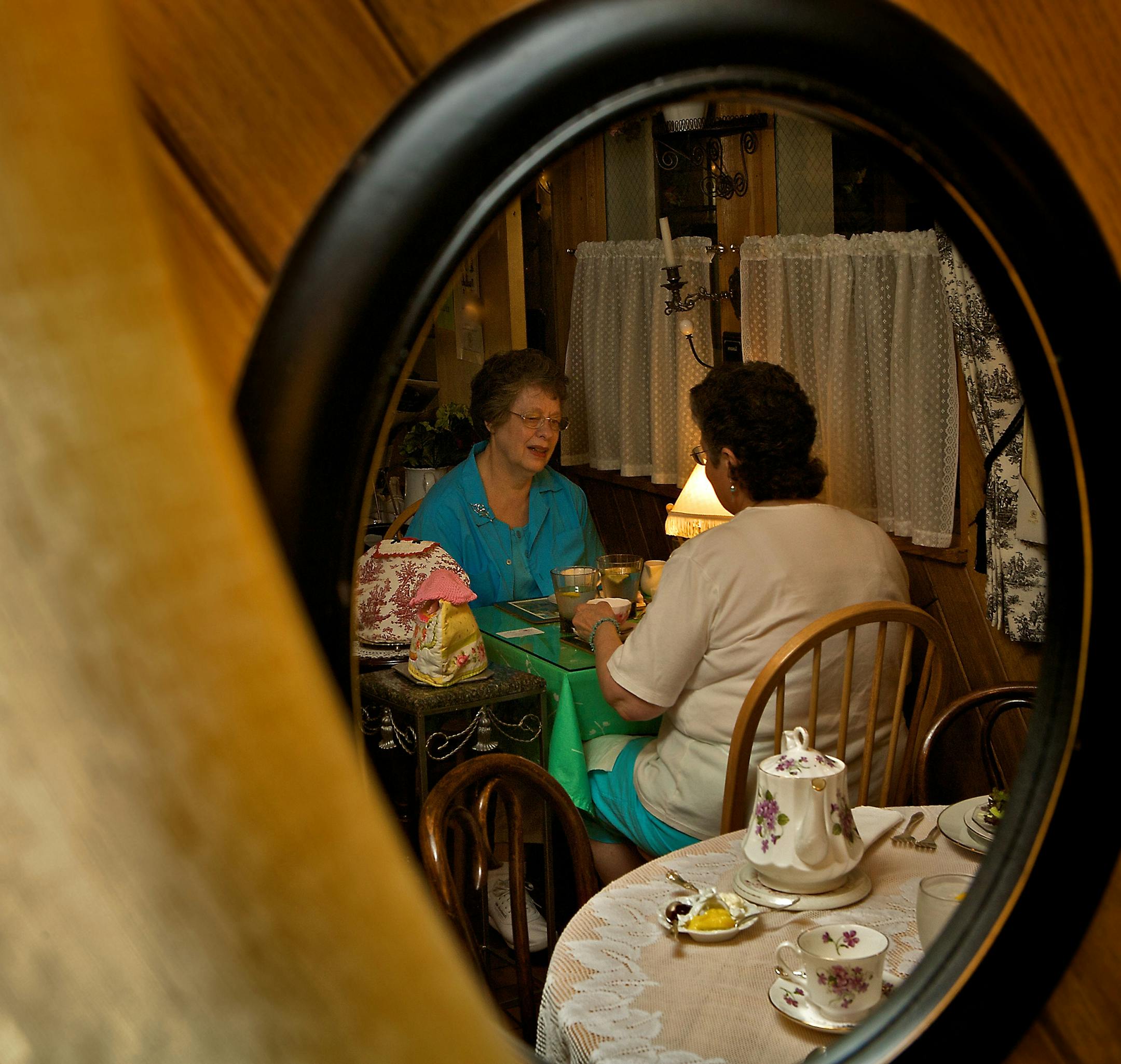 Artis Johnson, left, from White Bear Lake, enjoys a Chai tea and Jeannette Brown, of Roseville, enjoys apricot green tea at Avalon Tearoom & Pastry Shoppe. The shop is filled with antiques, teapots, cups and saucers and bulk tea for sale.