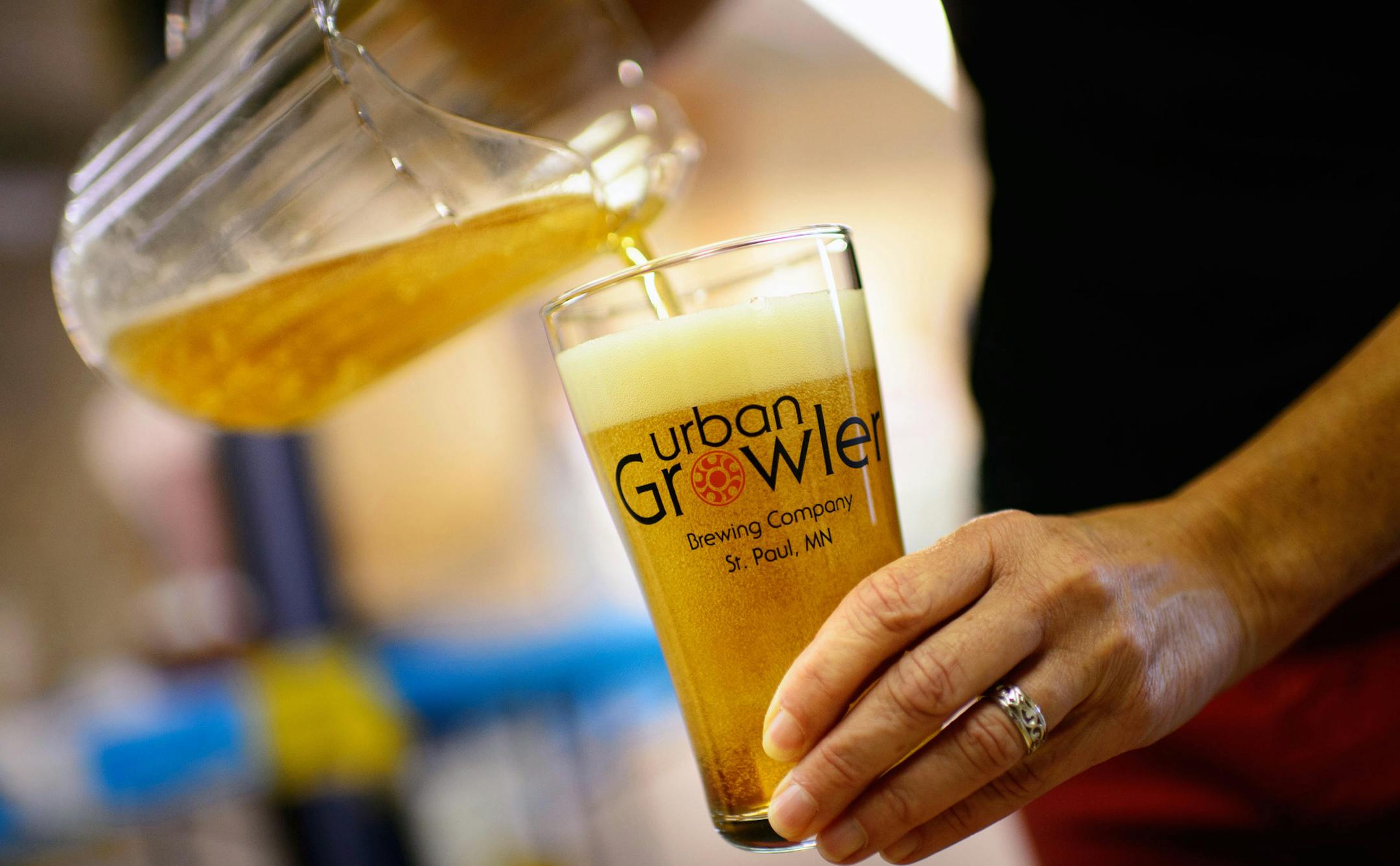 Jill poured a CowBell Cream Pie Ale at Urban Growler. They plan to have 8 beers on tap, rotating through 4 traditional and four specialty brews. Deb Loch and Jill Pavlak, owners of Urban Growler Brewing Company in St. Paul. They expect to open their packaging microbrewery by the end of winter. Friday, October 11, 2013 ] GLEN STUBBE * gstubbe@startribune.com