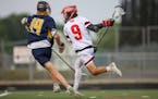 Dillon Tushie (20), shown covering Lakeville North's Blake Piscitello during last season's state title game, handles difficult assignments for Prior L