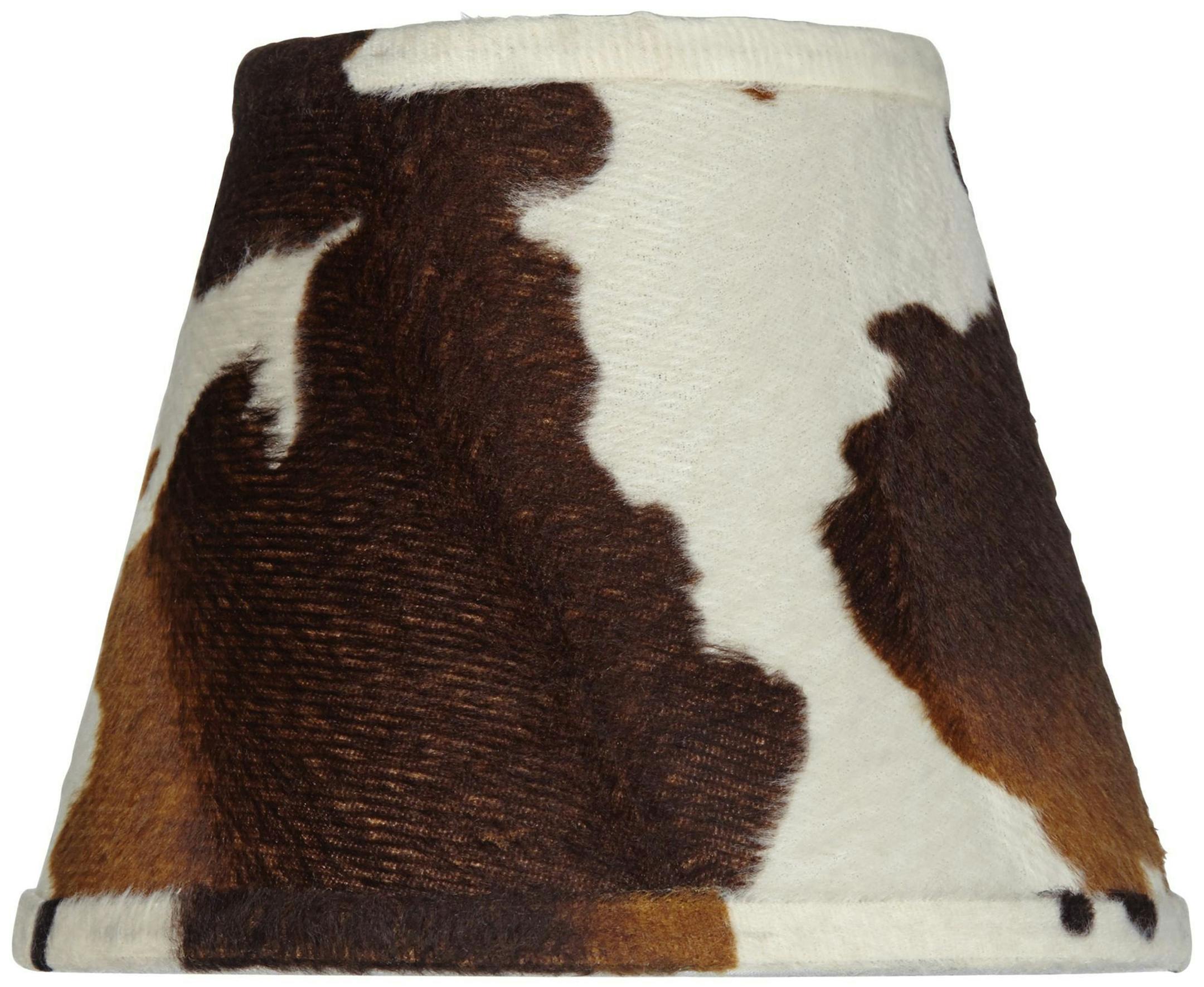 This pony hide is faux, in a 3 1/2 x 6.5 1/2 inch shade, $14.00 at Lamps Plus, www.lampsplus.com (Lamps Plus)