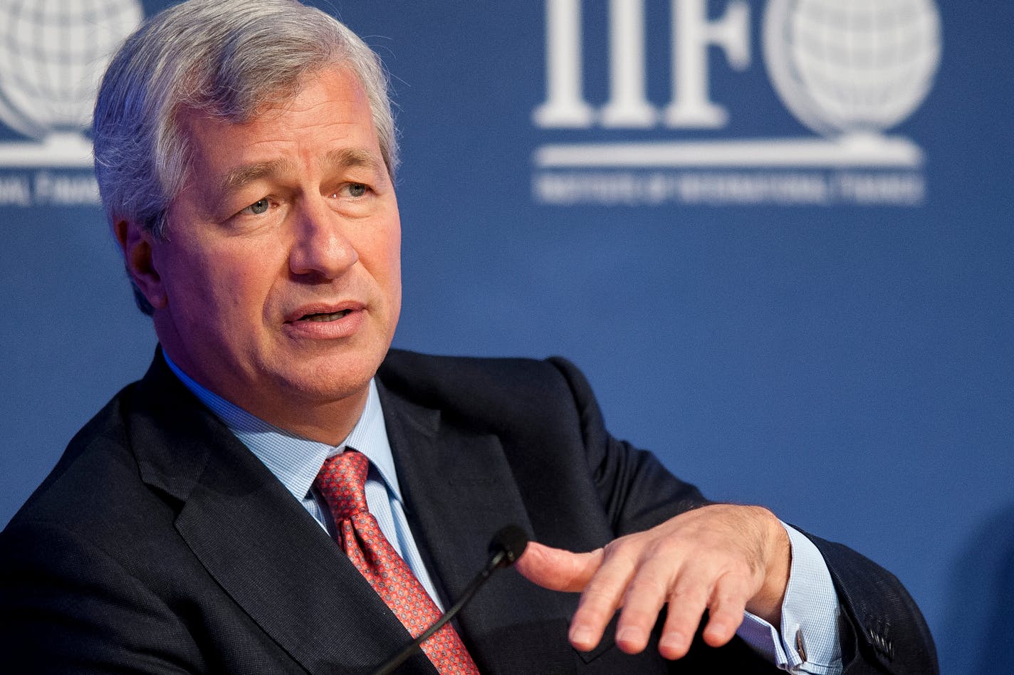 Jamie Dimon, chairman, president and chief executive officer of JPMorgan Chase & Co., speaks at the Institute of International Finance Annual Membership Meeting in Washington, D.C., U.S., on Saturday, Oct. 12, 2013. The meeting will provide an overview and several perspectives on the macroeconomic environment as well as the prospects ahead for the global economy. Photographer: Pete Marovich/Bloomberg *** Local Caption *** Jamie Dimon