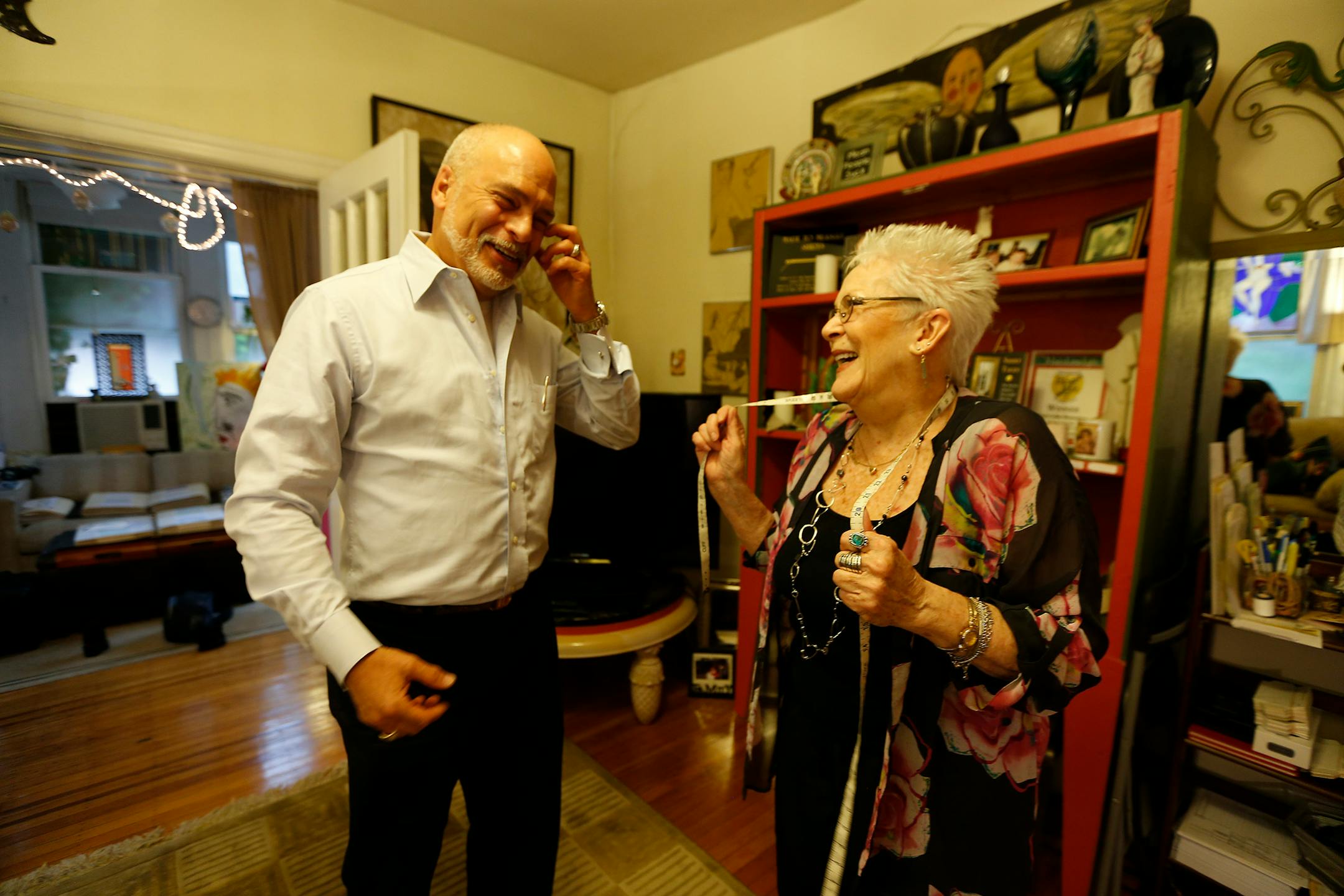 Nancy Gold sizes Alex Horn for a shirt in her home studio, King's Collar Shirtmakers, in Ardmore. At 76, she not only thinks she has plenty to contribute to men's attire, but also a lifetime of lessons start-ups can learn from. So she's written a book, "Shirt Tales: The Stories Behind a Successful Start-up" and started a consulting business. (David Maialetti/Philadelphia Inquirer/TNS) ORG XMIT: 1203965