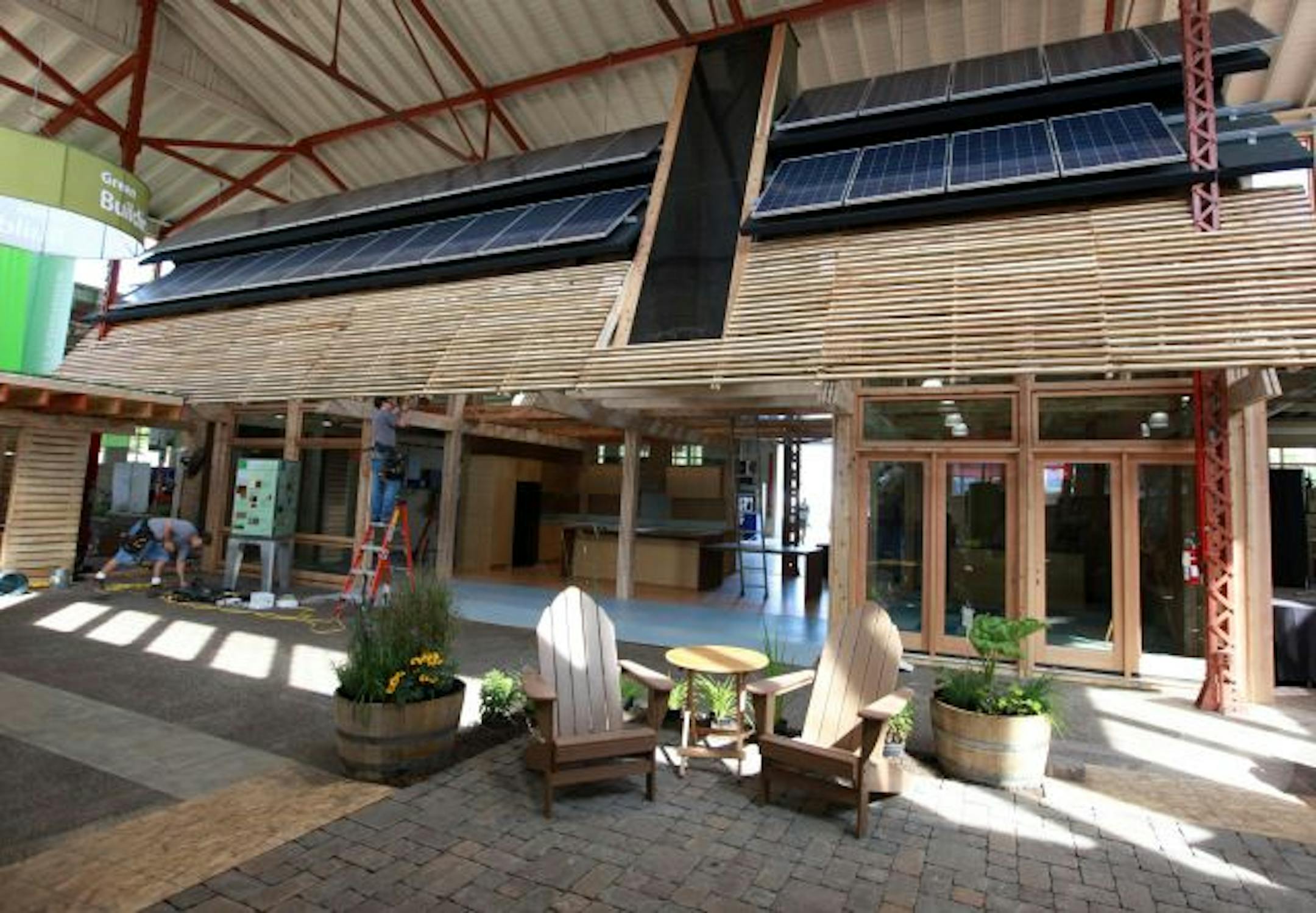 The State Fair's Ecohouse 2009, designed by David O'Brien Wagner of Sala Architects, sports a solar chimney, solar panels and rain-saving pavers.