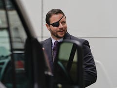 Rep.-elect Dan Crenshaw, R-Texas, leaves after attending orientation for new members of Congress, Tuesday, Nov. 13, 2018, in Washington. (AP Photo/Pab