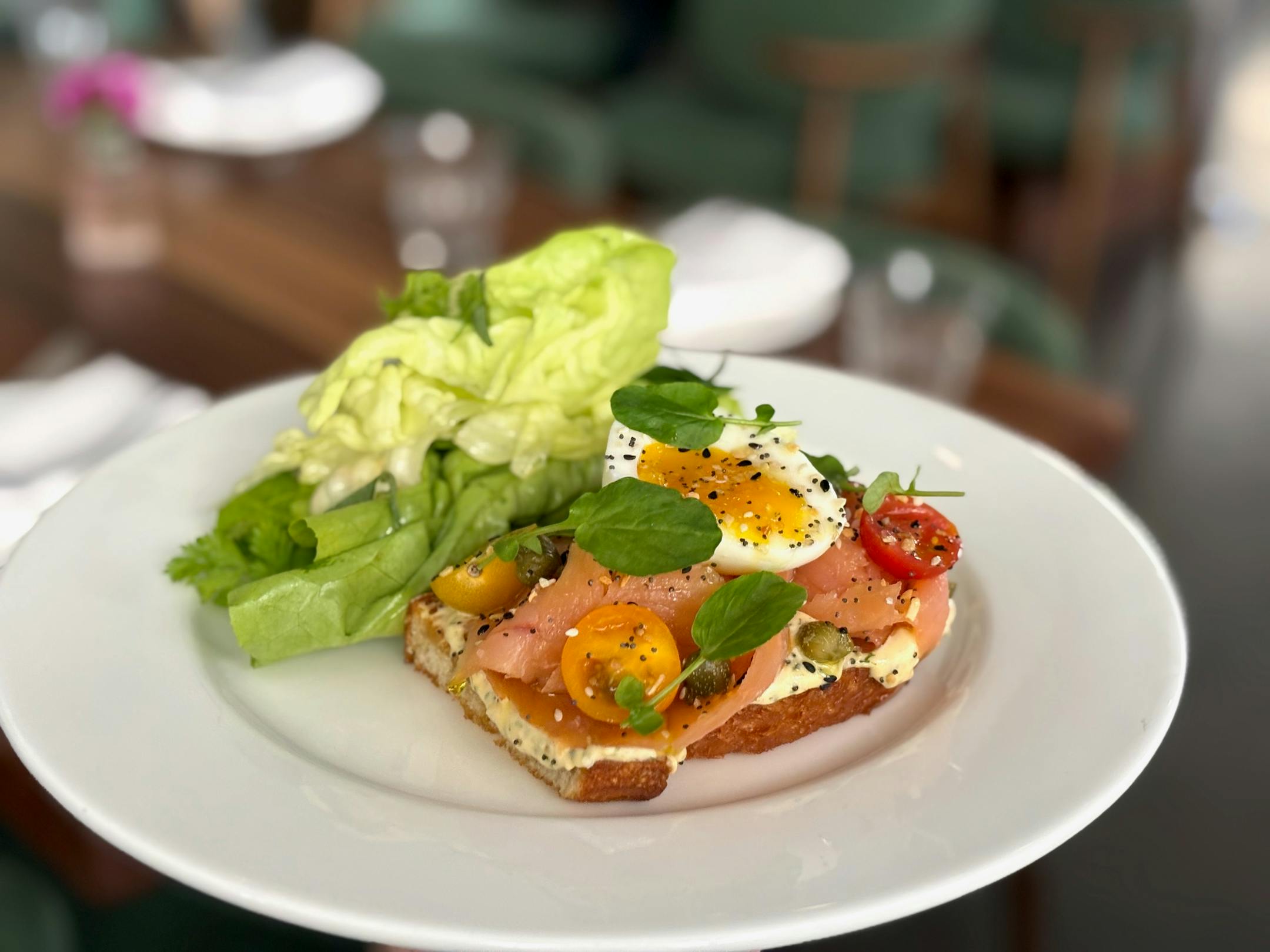 Thèrése's Salmon Tartine with everything bagel mayo, capers, tomatoes and soft boiled egg.