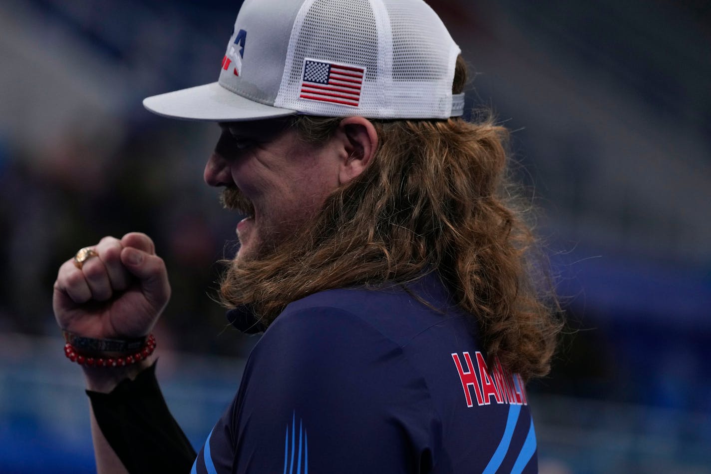 United States' Matt Hamilton, smiles, during the men's curling match against the Russian Olympic Committee, at the 2022 Winter Olympics, Wednesday, Feb. 9, 2022, in Beijing. (AP Photo/Nariman El-Mofty)