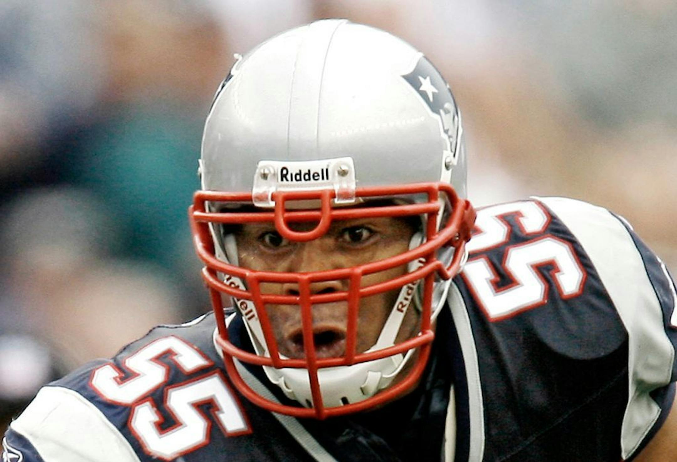 2007 file photo: New England Patriots linebacker Junior Seau runs during a game against the Cleveland Browns. A pair of wrongful-death lawsuits over the suicide of Seau were consolidated with NFL concussion litigation.