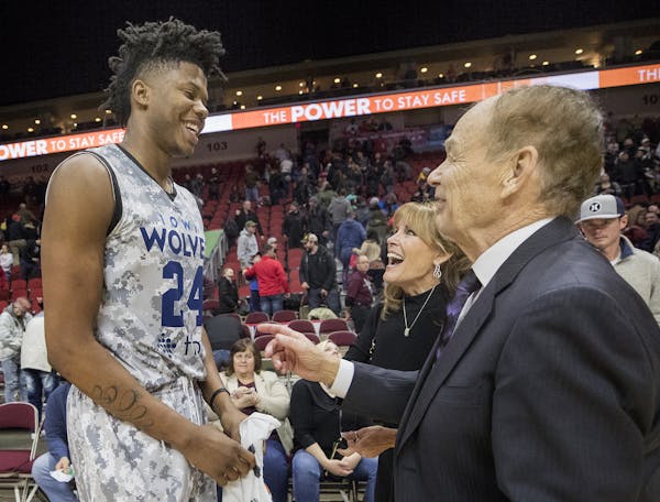 Timberwolves owner Glen Taylor and his wife Becky Mulvihill greeted Justin Patton at the end of an Iowa Wolves game. Patton was playing in his first g