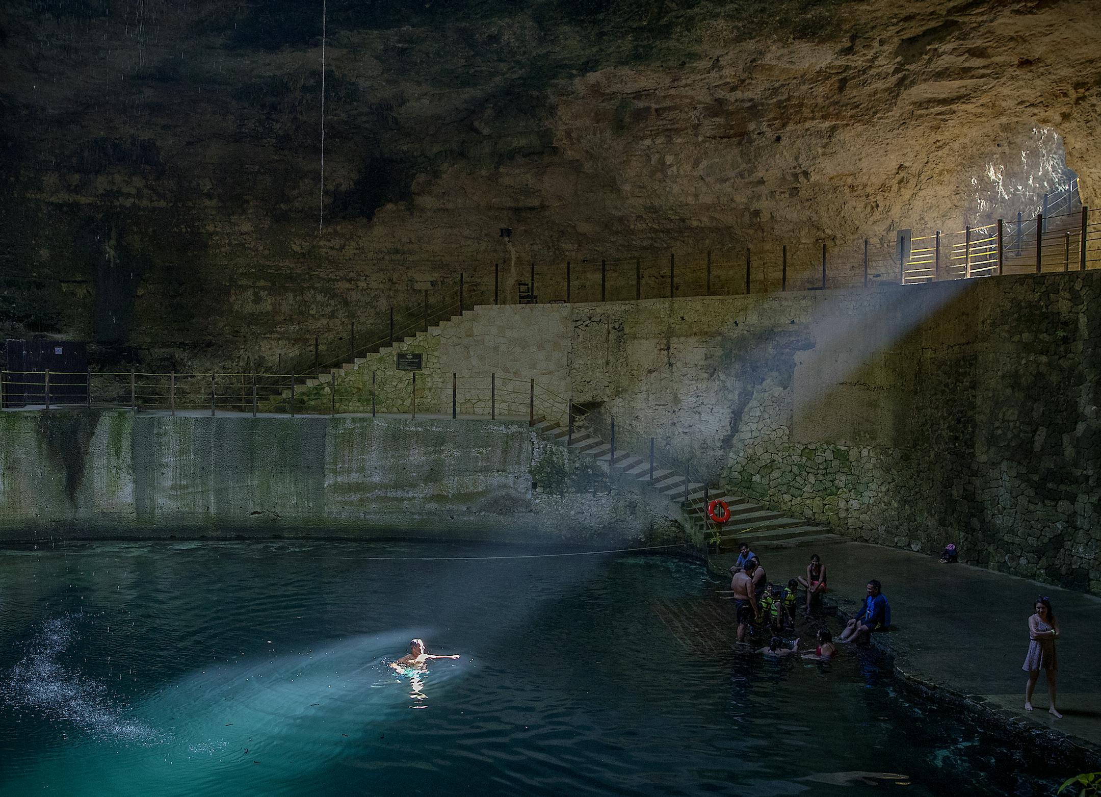 Light from the outside shined on the water in Cenote Hubiku, Yucatan, Mexico. The Cenote Hubiku, a Mayan sacred site, has a maximum depth of 150 feet and is located in Valladolid, Mexico. ] ELIZABETH FLORES &#x2022; liz.flores@startribune.com