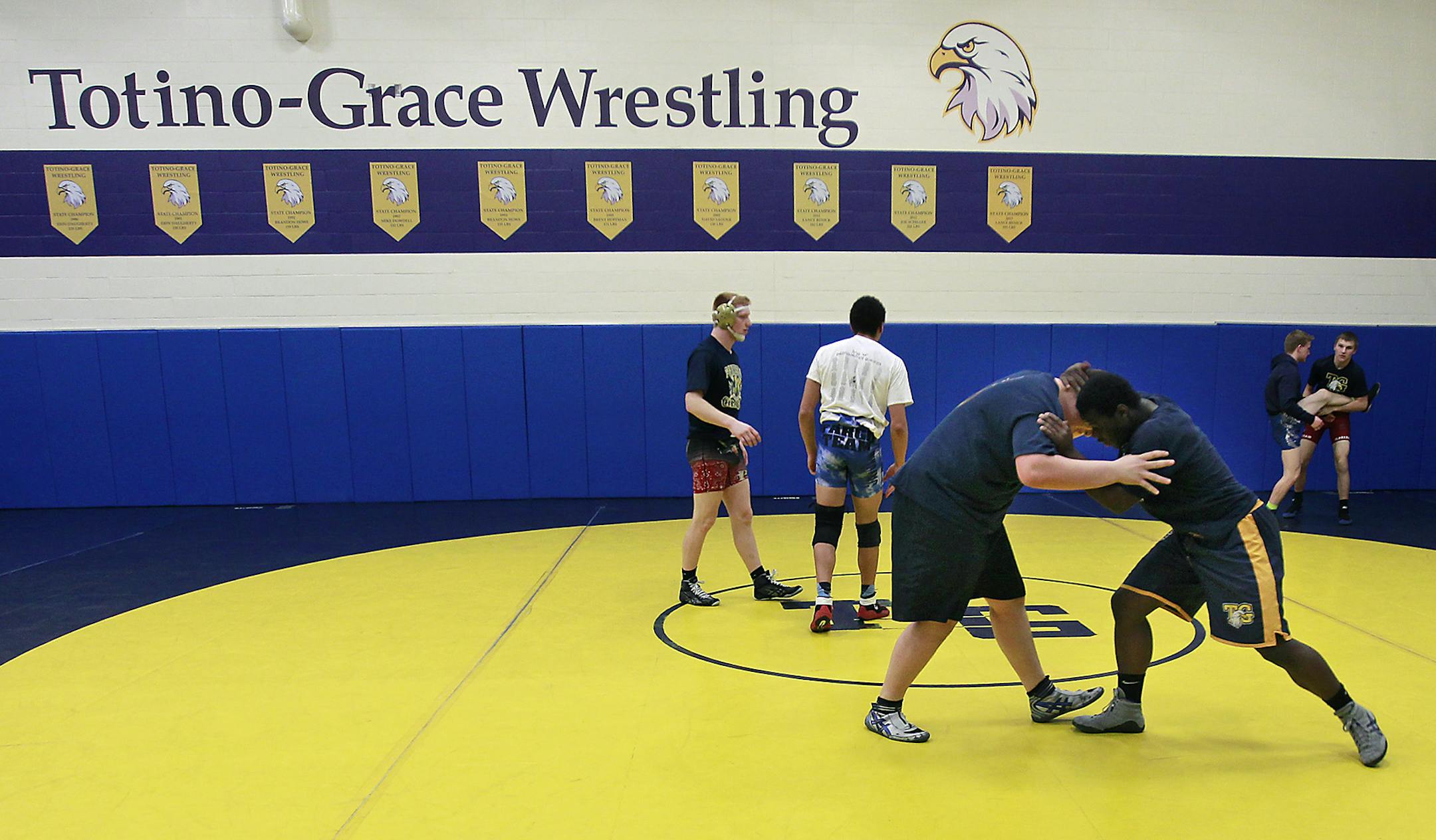 Totino-Grace wrestlers tuned up for this week’s state meet. The team has qualified for state largely on the strength of athletes in the higher weight classes. (Elizabeth Flores, Star Tribune)