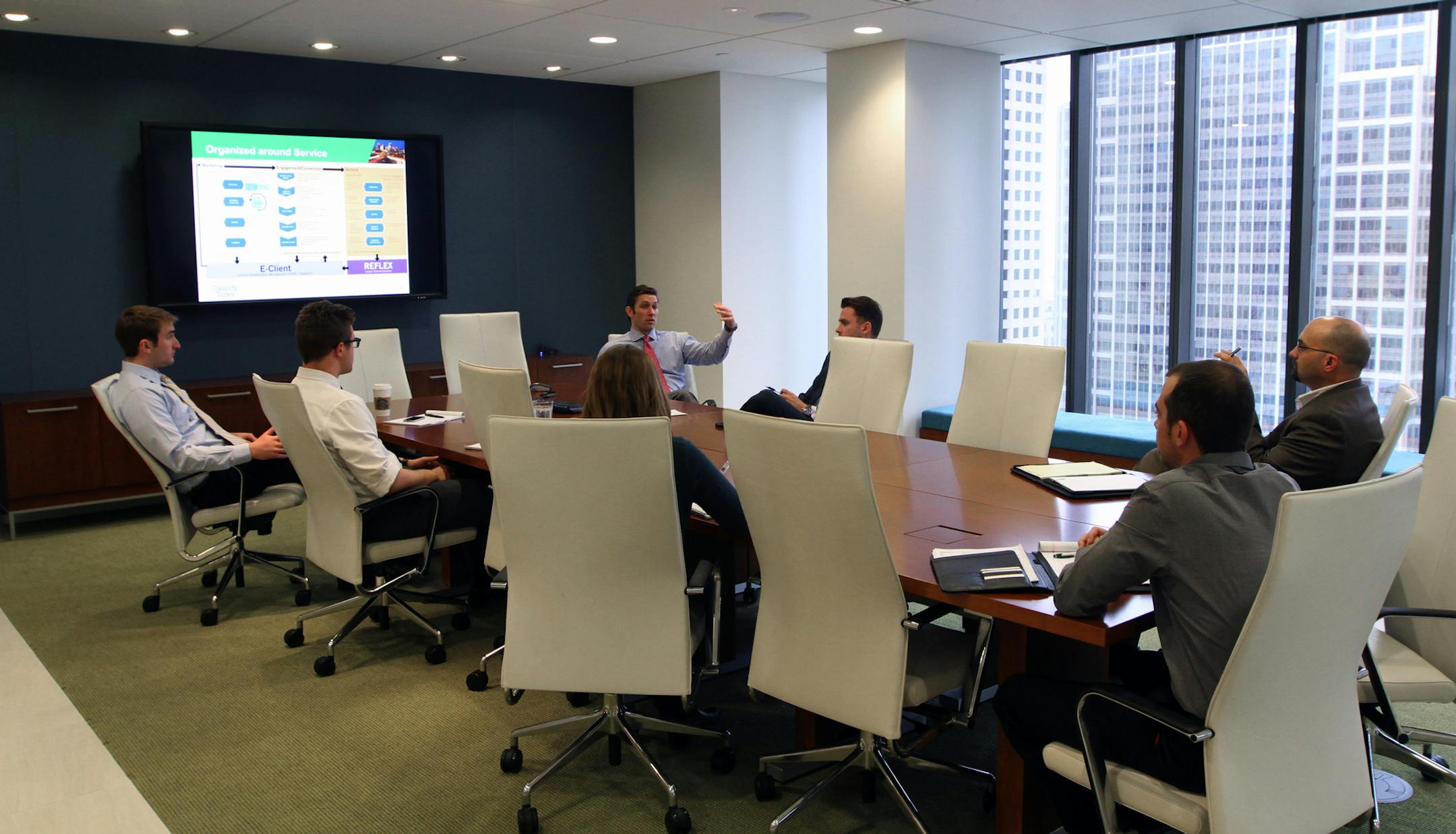 Real estate firm Cassidy-Turley has recently moved its offices into the IDS Center. The design of the firm's office has Millenials in mind -- less cubicle and more confabbing. Photographed on 4/11/13.] Bruce Bisping/Star Tribune bbisping@startribune.com