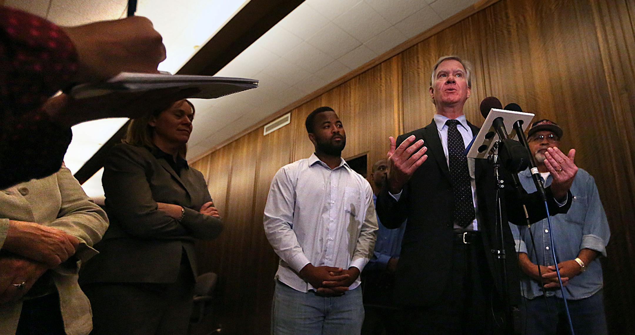 Rashad Turner, the leader of the St. Paul Black Lives Matter group (at Colemanís left in photo), St. Paul Mayor Chris Coleman (at mic stand) and Saint Paul Deputy Mayor, Kristin Beckmann (left) were among those who appeared before members of the media following a meeting Thursday morning at the Mayorís office. ] JIM GEHRZ ï james.gehrz@startribune.com / Edina, MN / October 1, 2015 / 10:00 AM ñ BACKGROUND INFORMATION: St. Paul Mayor Chris Coleman meets with Rashad Turner, orga