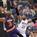 Phoenix Suns guard Isaiah Thomas (3) hits a shot while being defended by Minnesota Timberwolves guard Mo Williams (25) during the fourth quarter.