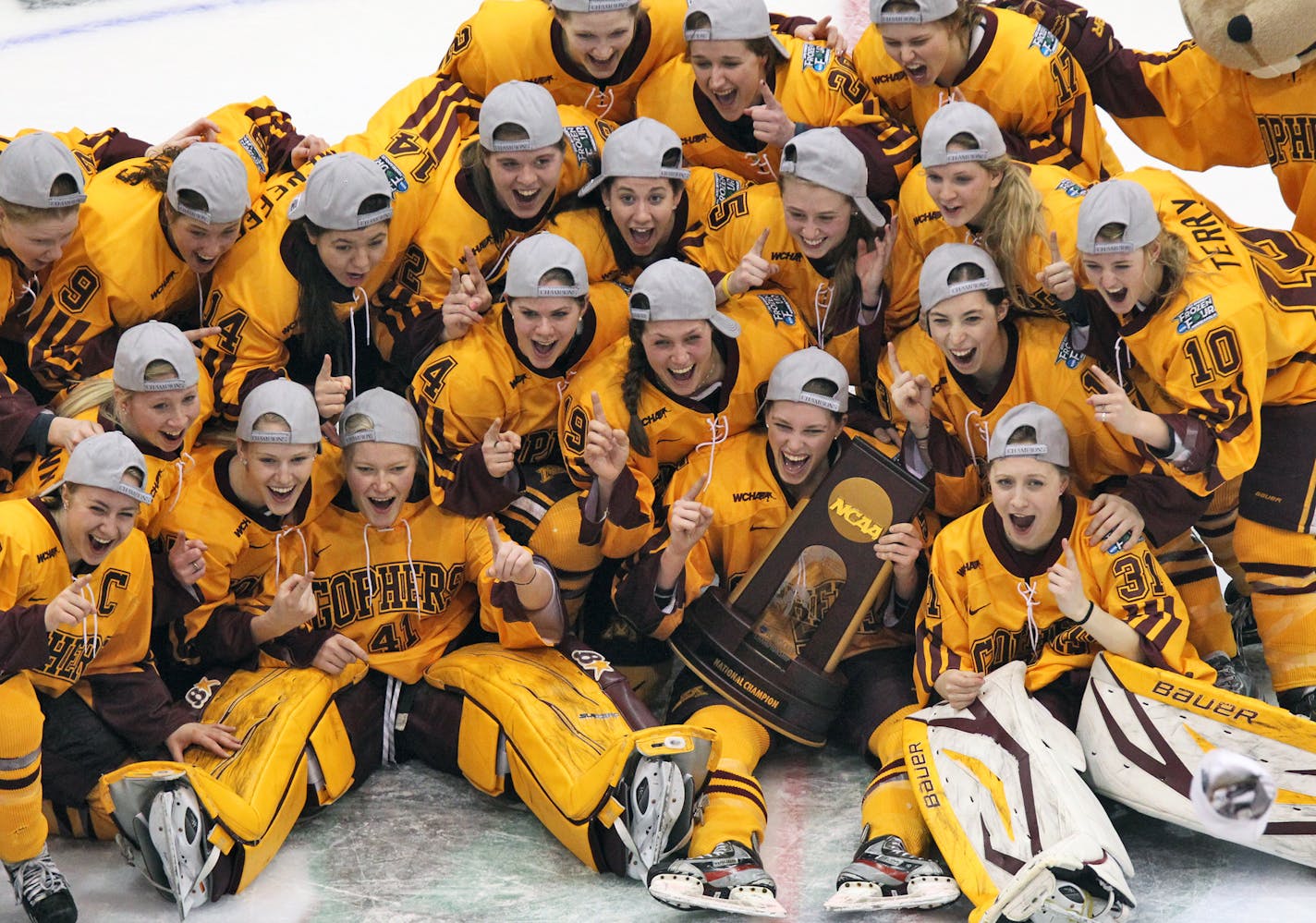 Frozen Four championship game - Minnesota Gophers vs. Boston University (BU) Terriers. Minnesota won 6-3. Gophers celebrated with their championship trophy. (MARLIN LEVISON/STARTRIBUNE(mlevison@startribune.com (cq program) ORG XMIT: MIN1303241806430197