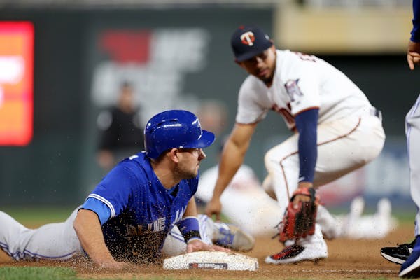 Toronto's Luke Maile stole third base in the 10th inning at Target Field on Tuesday