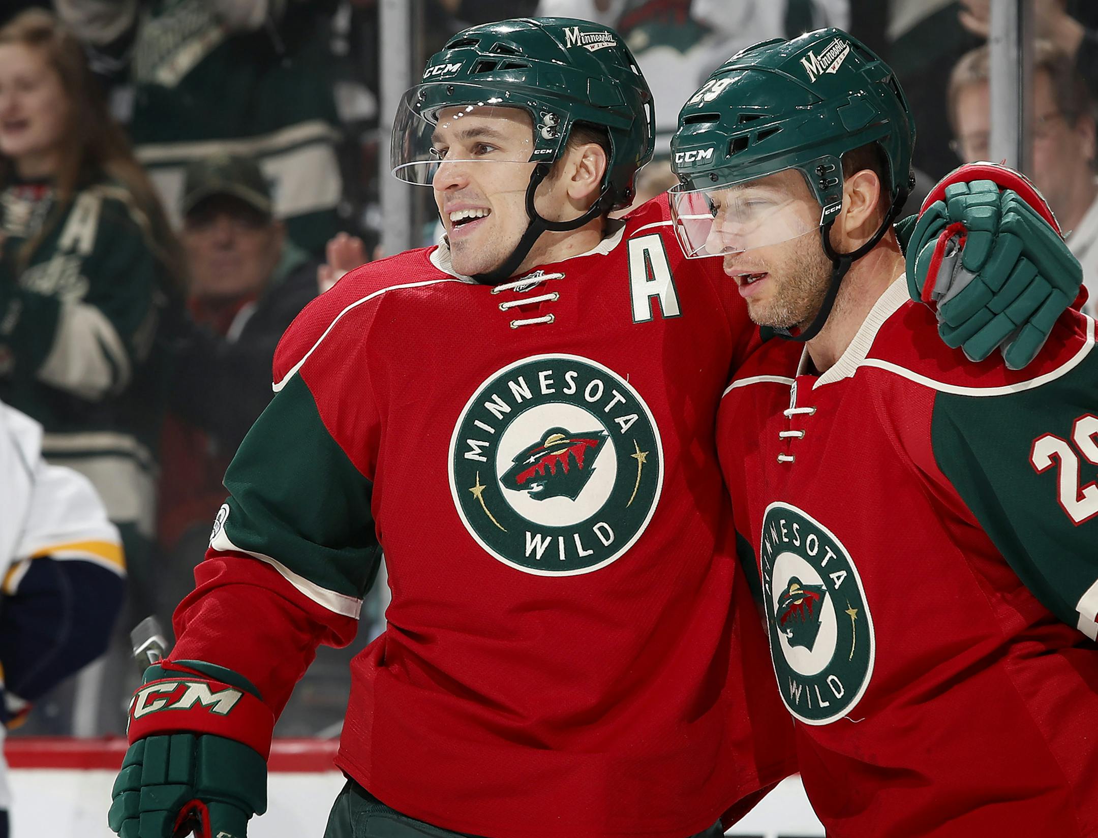Zach Parise (11) and Jason Pominville (29) celebrated a goal by Pominville in the first period. ] CARLOS GONZALEZ cgonzalez@startribune.com - January 22, 2017, St. Paul, MN, Xcel Energy Center, NHL, Hockey, Nashville Predators at Minnesota Wild
