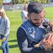 Minnesota United defender DJ Taylor held a puppy from Ruff Start Rescue in Princeton, Minn., at the team’s training session Wednesday in Blaine.