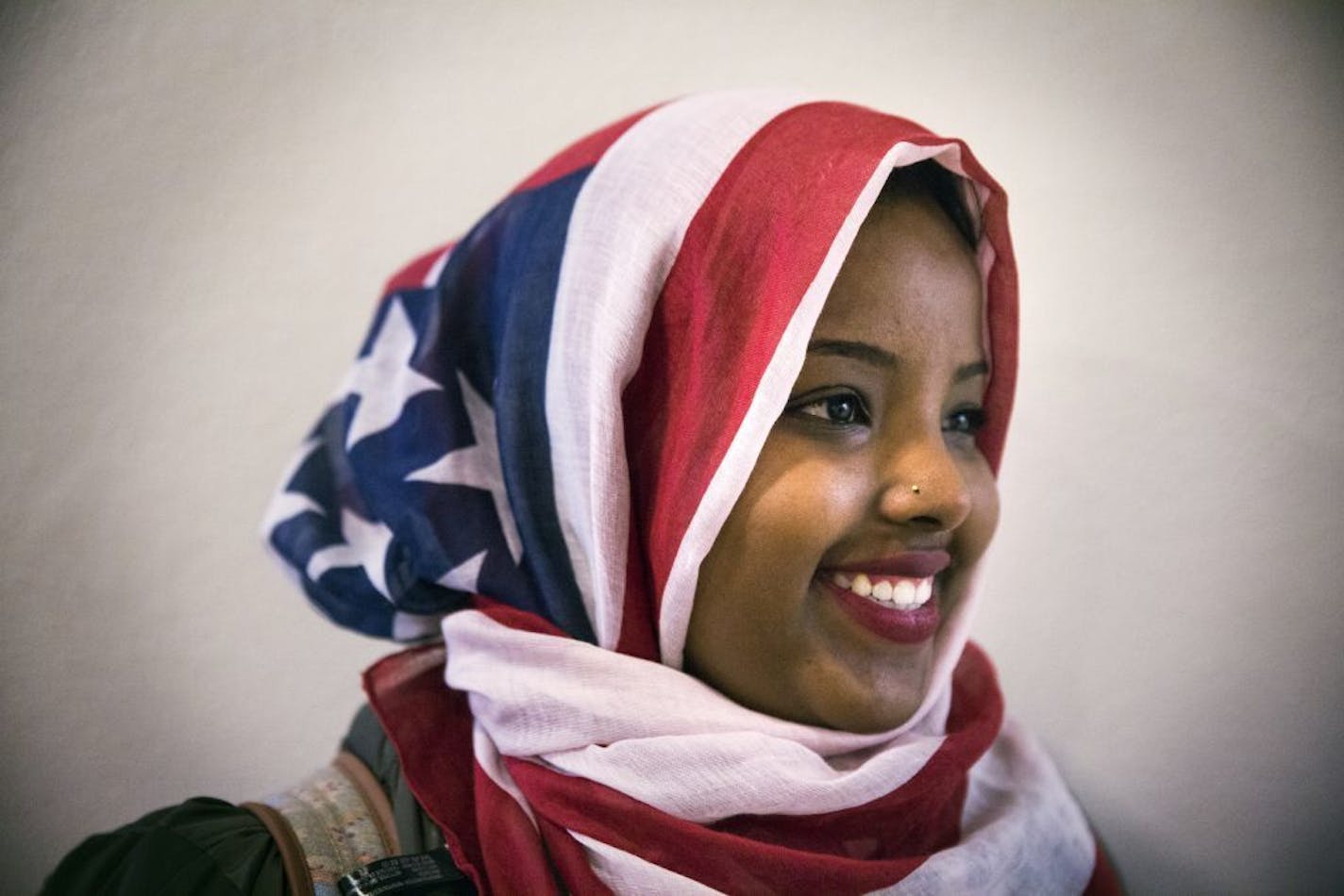 St. Cloud State student Barwaaqo Dirir, 21, decided to wear an American flag hijab for the first time while attending a talk by Jaylani Hussein, executive director of the Minnesota chapter of the Council of American Islamic Relations of Minnesota (CAIR-MN) on Islamophobia in Minnesota at St. Cloud State University on Tuesday, February 9, 2016. "I woke up this morning and people were looking at me differently, said Dirir. "This is my home. We're not going anywhere."