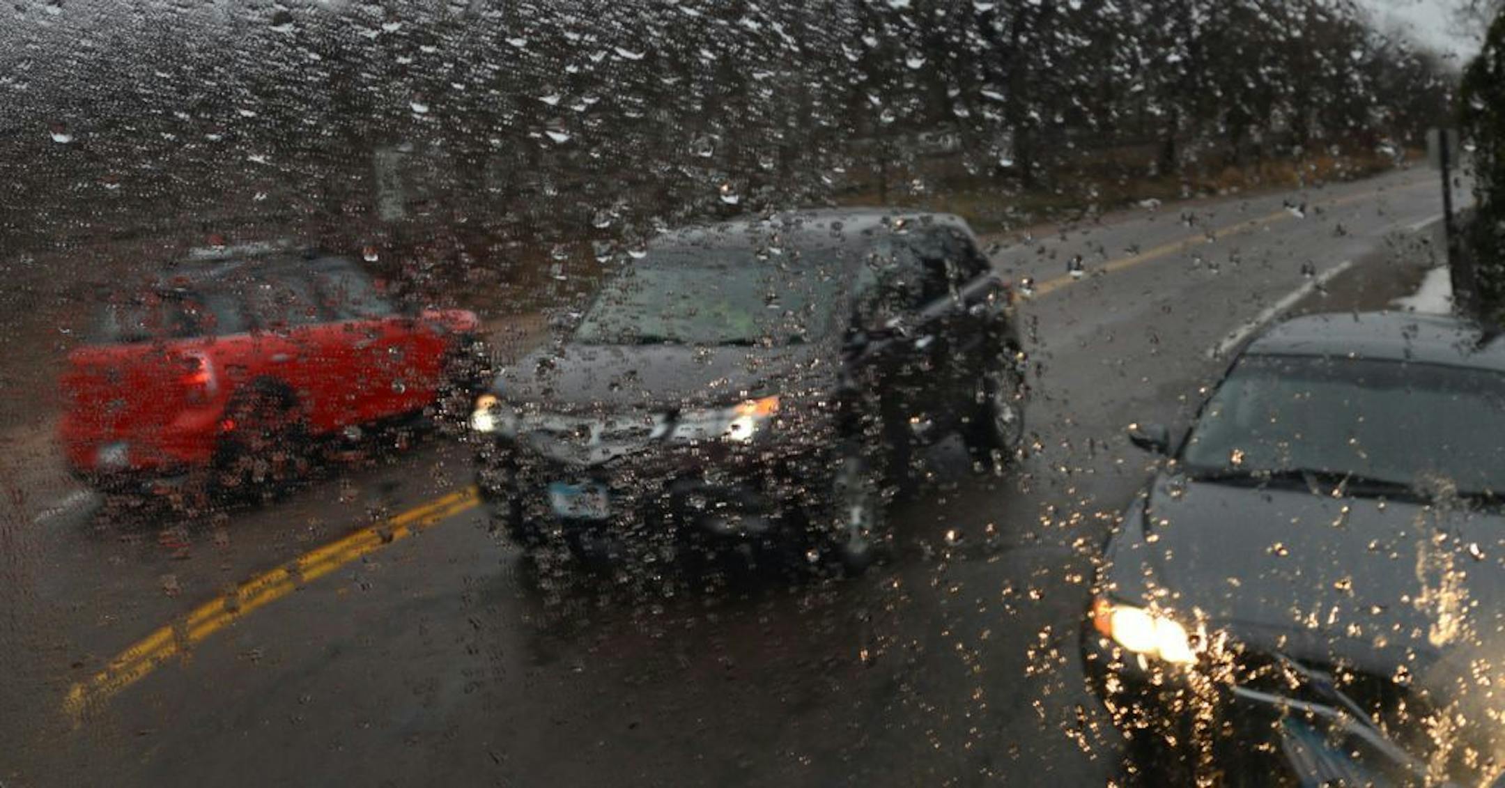 This rain spattered mirror on Eastman Lane in Wayzata on Thursday morning reflects another dreary day.