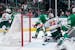 Minnesota Wild goaltender Cam Talbot (33) looks back to see the puck in the net after Dallas Stars' Tyler Seguin (91) scored in the first period of an