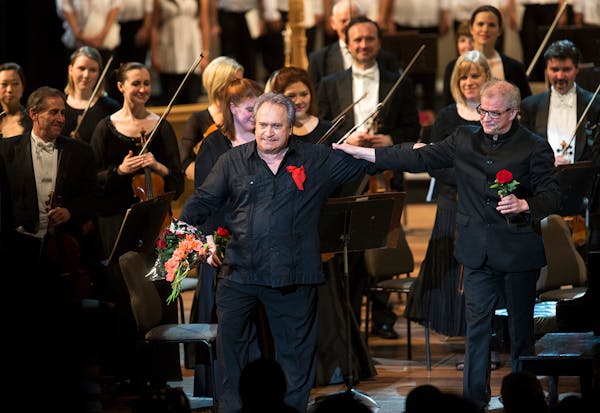 Cuban piano player Frank Fernandez, left, and Minnesota Orchestra music director Osmo Vanska take bows during Minnesota Orchestra's first concert of t