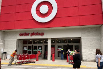 Customers arrive at a Target store, Wednesday, June 2, 2021, in North Miami Beach, Fla. Target says Thursday, Sept. 23, it will hire fewer seasonal wo