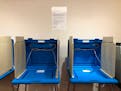 This Jan. 9, 2020, photo shows voting booths already set up at the Hennepin County Government Center in downtown Minneapolis in preparation for the st