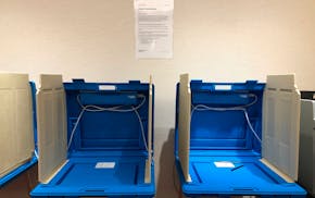 This Jan. 9, 2020, photo shows voting booths already set up at the Hennepin County Government Center in downtown Minneapolis in preparation for the st