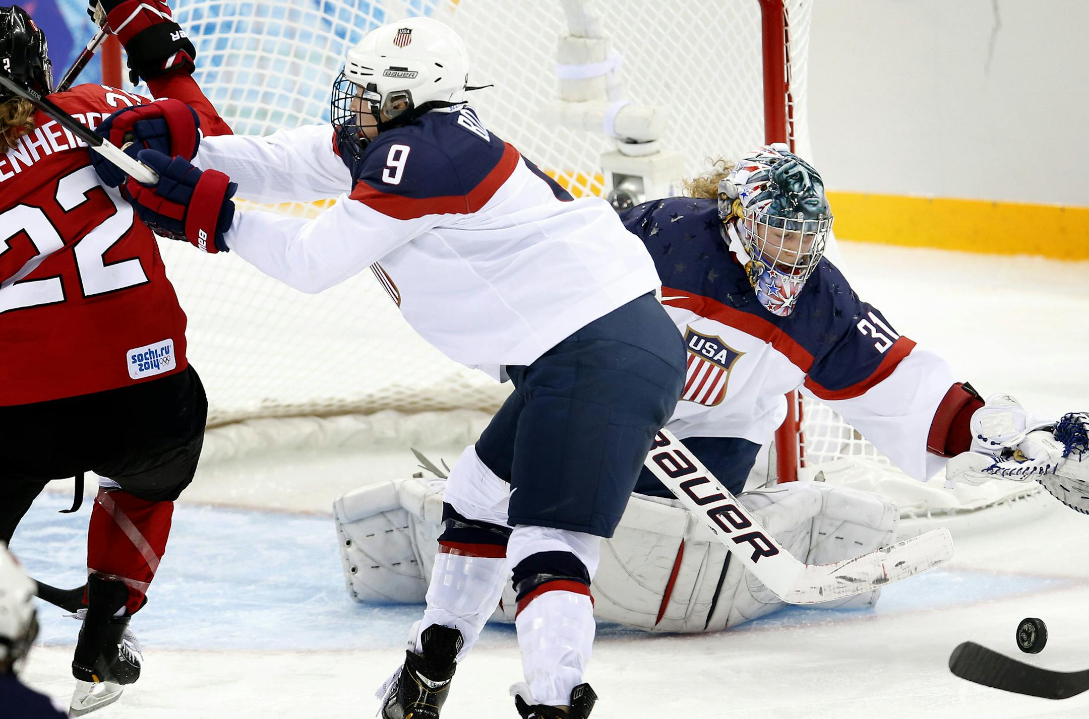 Hayley Wickenheiser (22) of Canada scored against the USA during the 2014 Olympics.