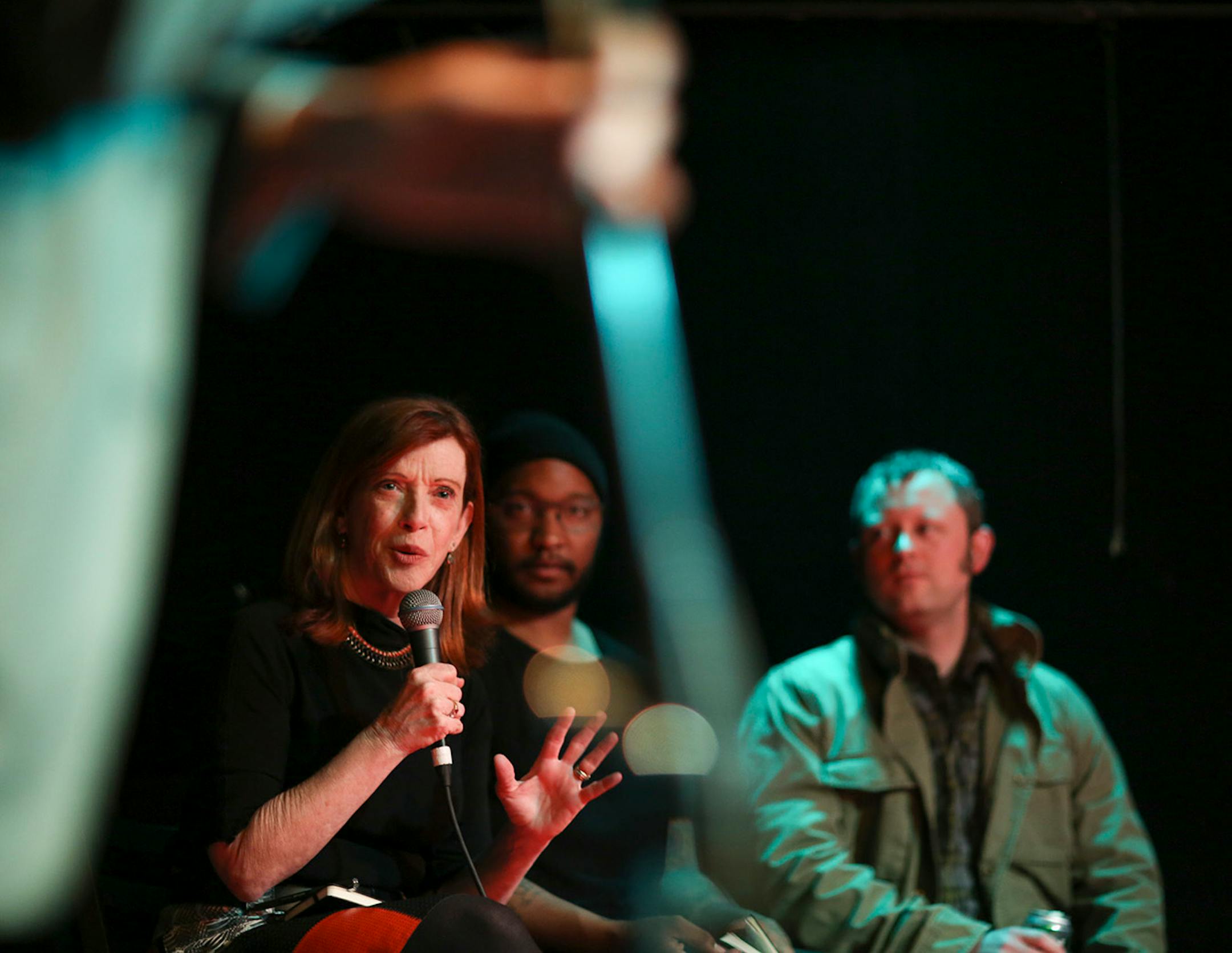 Judges Susan Orlean, Stefon Alexander, better known by his stage name P.O.S, and Benjamin Percy, from left, were the judges at the Literary Death Match Wednesday night at Nomad World Pub. Orlean is a New Yorker staff writer and author of the Orchid Thief, was tasked with judging "intangibles" of the performances. Alexander is a founding member of the local hip hop collective Doomtree. Percy is the author of The Dead Lands and The Wilding. ] JEFF WHEELER • jeff.wheeler@startribune.com One of the