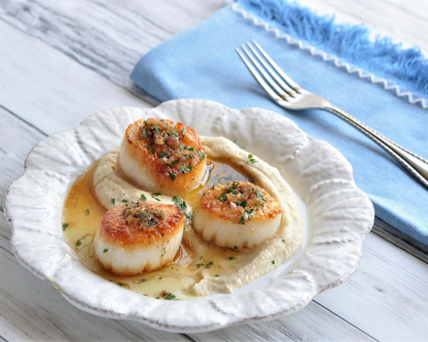 Seared Scallops With Brown Butter Lemon Sauce and Roasted Cauliflower Pur&#xe9;e. Photo by Meredith Deeds * Special to the Star Tribune