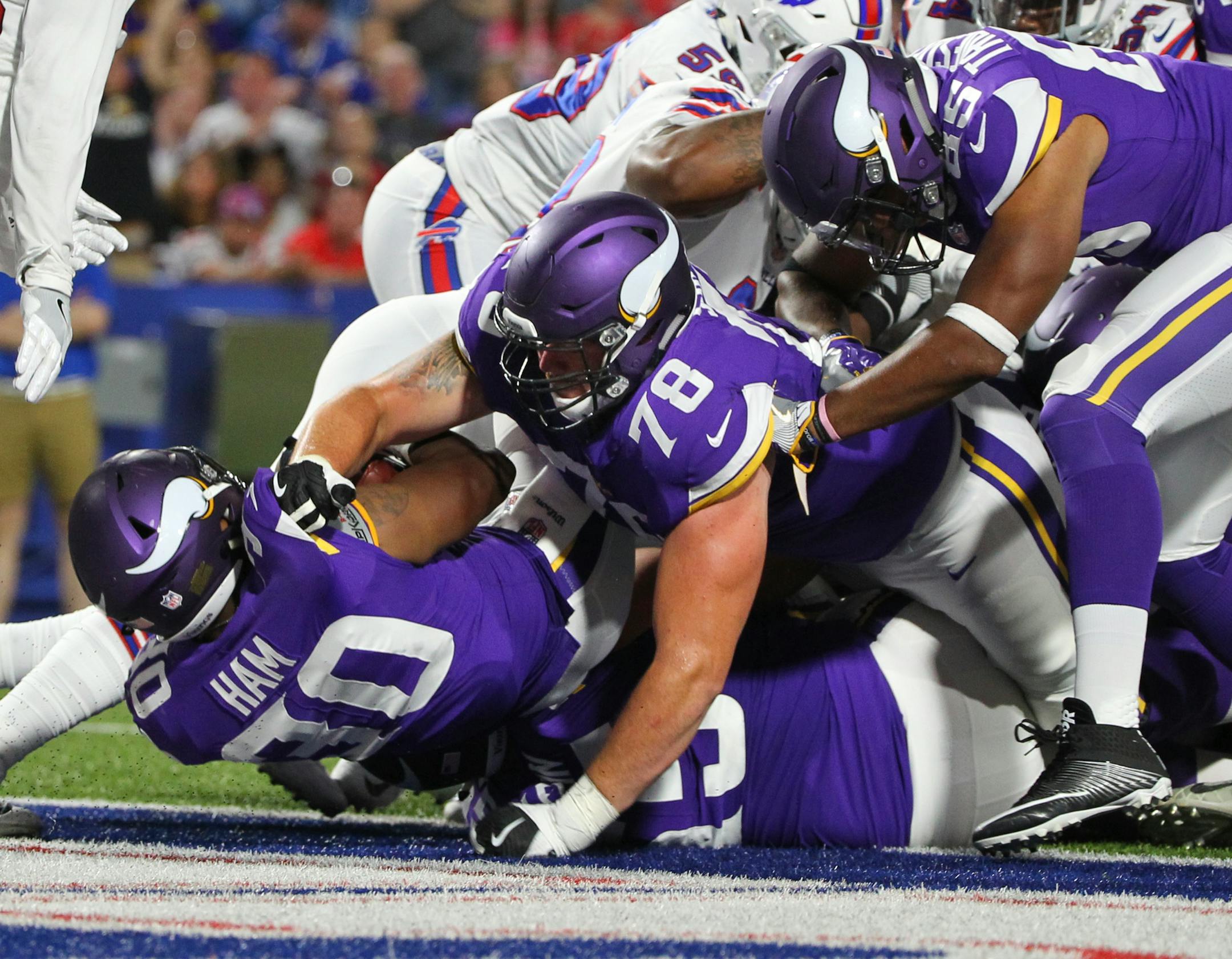 Vikings running back C.J. Ham (30) rushed for a touchdown during the second half against the Bills on Thursday. Injuries to the offensive line are likely to clear up before the regular season, but they're still limiting the time the team can spend solidifying its ideal five-man combination.
