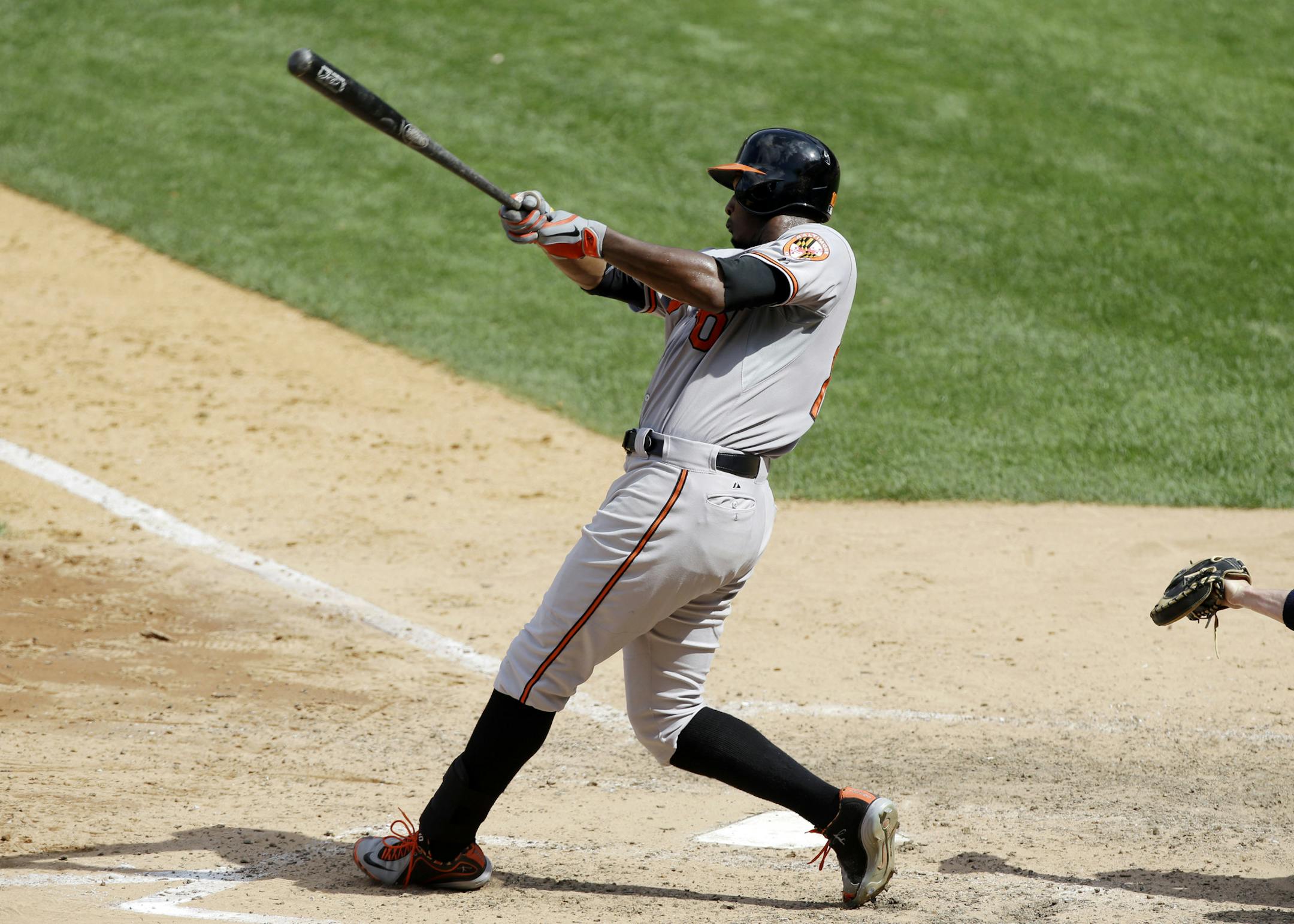 Baltimore Orioles Adam Jones hits a ninth-inning, two-run home run off New York Yankees relief pitcher Mariano Rivera in the Orioles 2-1 victory over the Yankees in a baseball game Sunday, July 7, 2013, in New York. (AP Photo/Kathy Willens)