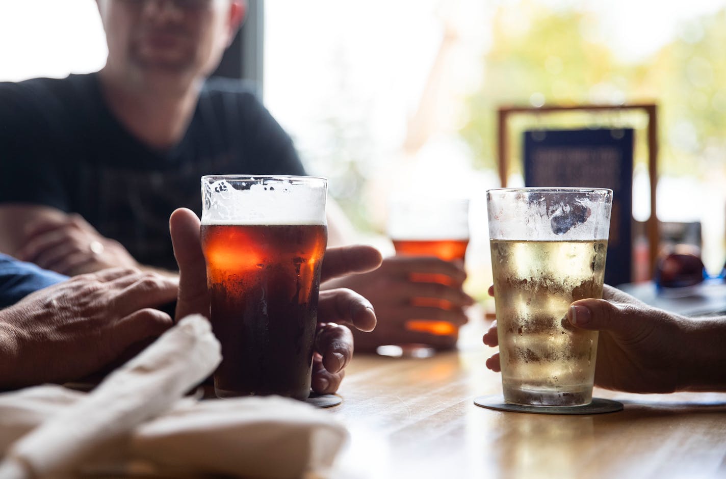 A group of friends enjoyed some beers on Thursday afternoon at Canal Park Brewery.] ALEX KORMANN • alex.kormann@startribune.com A tour of breweries and distilleries in Duluth, MN including Canal Park Brewery and Vikre Distillery, photographed on Thursday September 5, 2019.