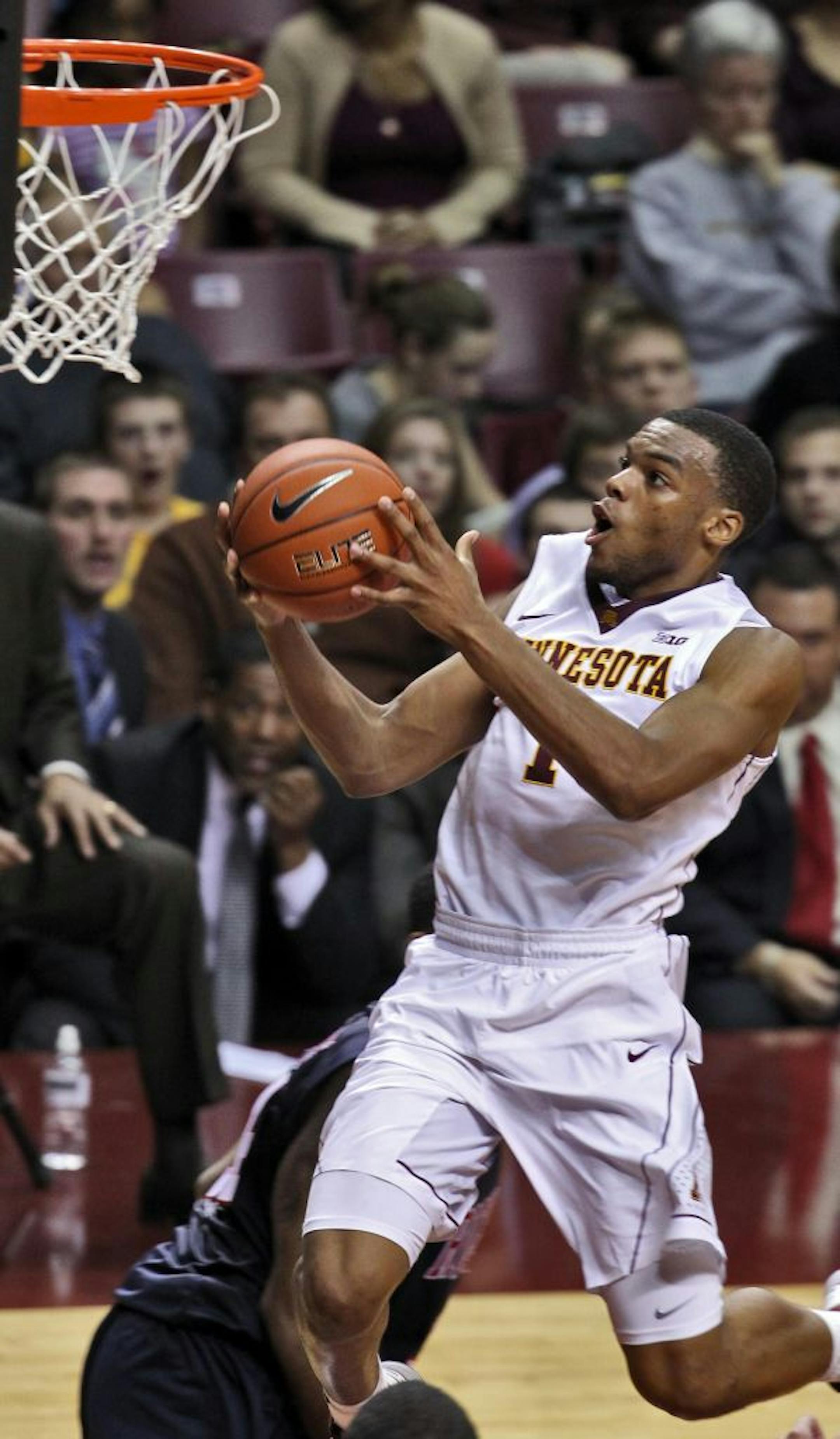 Andre Hollins scored 14 points, with a college-high seven assists and three steals, in the Gophers' 72-57 victory over Richmond on Sunday.