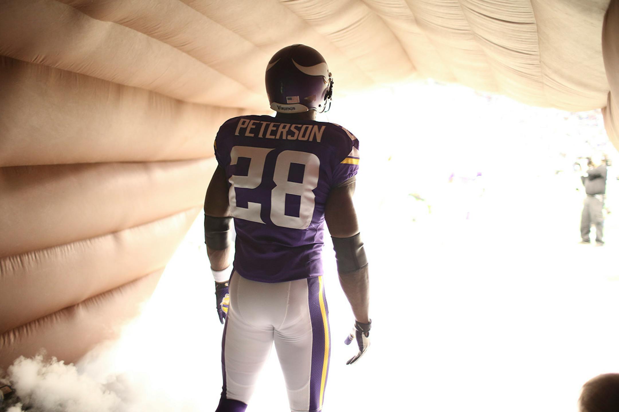 Minnesota Vikings running back Adrian Peterson (28) waited in the tunnel before being introduced before Sunday's game against the Chicago Bears, December 1, 2013 at Mall of America Field in Minneapolis..