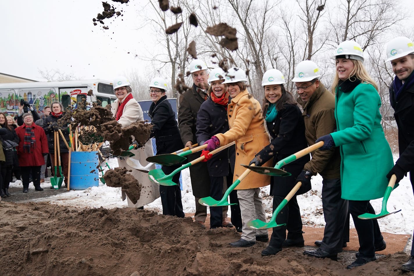 Officials ceremoniously threw dirt during Friday's long-awaited groundbreaking for the Southwest light-rail line.