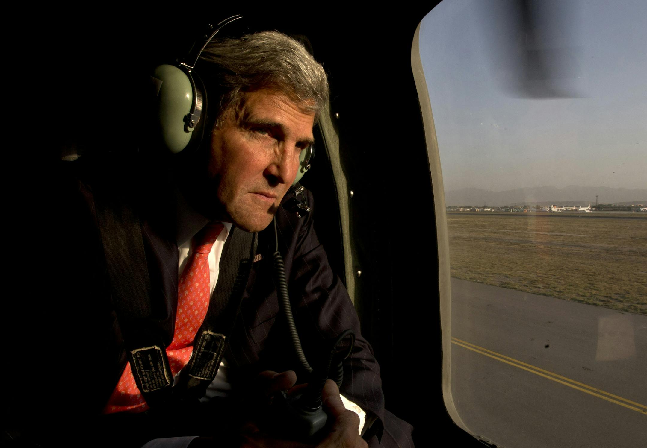 U.S. Secretary of State John Kerry takes off in a black hawk helicopter in Kabul, Afghanistan, after arriving on an unannounced visit to meet with Afghan President Hamid Karzai Friday, Oct. 11, 2013. (AP Photo/Jacquelyn Martin, Pool)