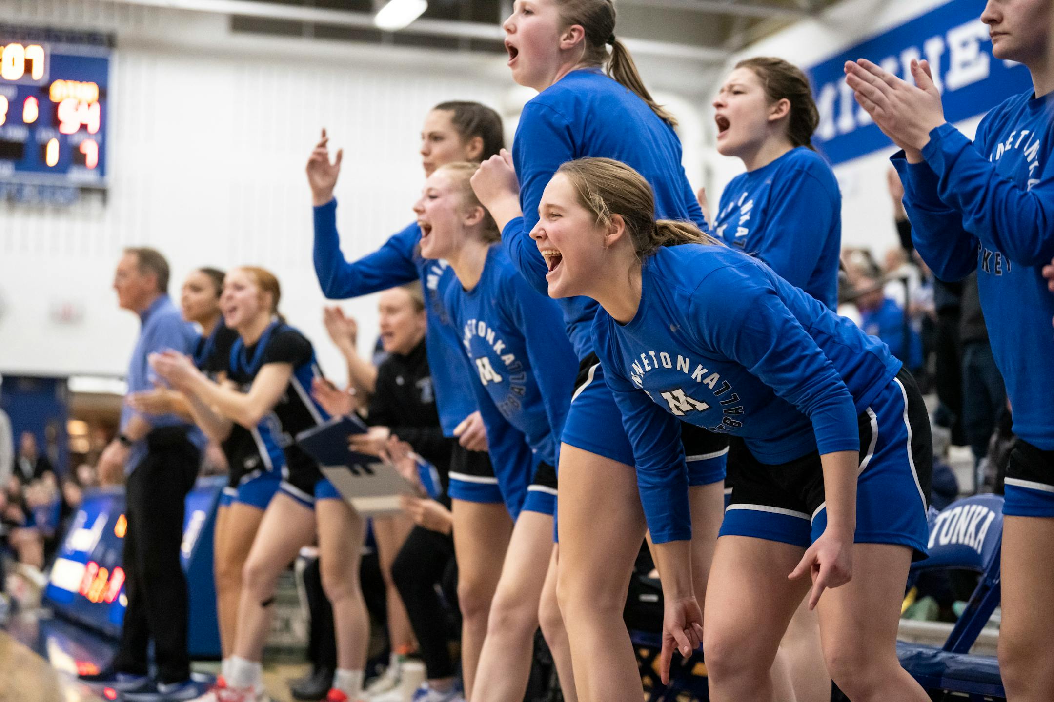 The Minnetonka bench cheers for the team as they lead in the final minutes of the second half. Minnetonka High School hosted St. Michael-Albertville, both undefeated Class 4A girls basketball teams, on Friday, Jan. 12, 2024 in Minnetonka, Minn. Minnetonka won 63-54. ] RENEE JONES SCHNEIDER • renee.jones@startribune.com