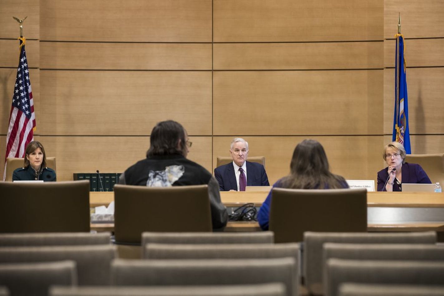 The Minnesota Board of Pardons, from left, Attorney General Lori Swanson, Governor Mark Dayton and Chief Justice Lorie Skjerven Gildea hear cases up for pardon extraordinary.