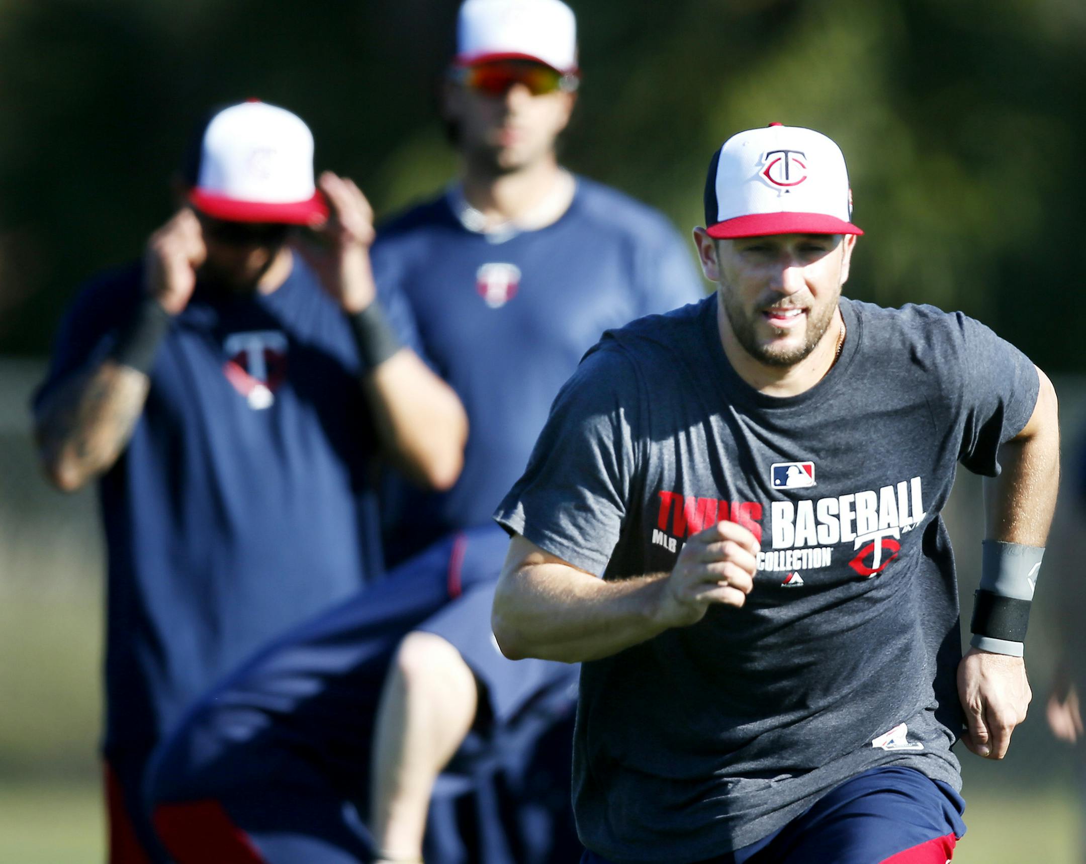 Trevor Plouffe ran sprints with infielders Tuesday Feb 17. 2014 in Fort Myers, Florida Lee County Sports Complex.. ] JERRY HOLT jerry.holt@startribune.com