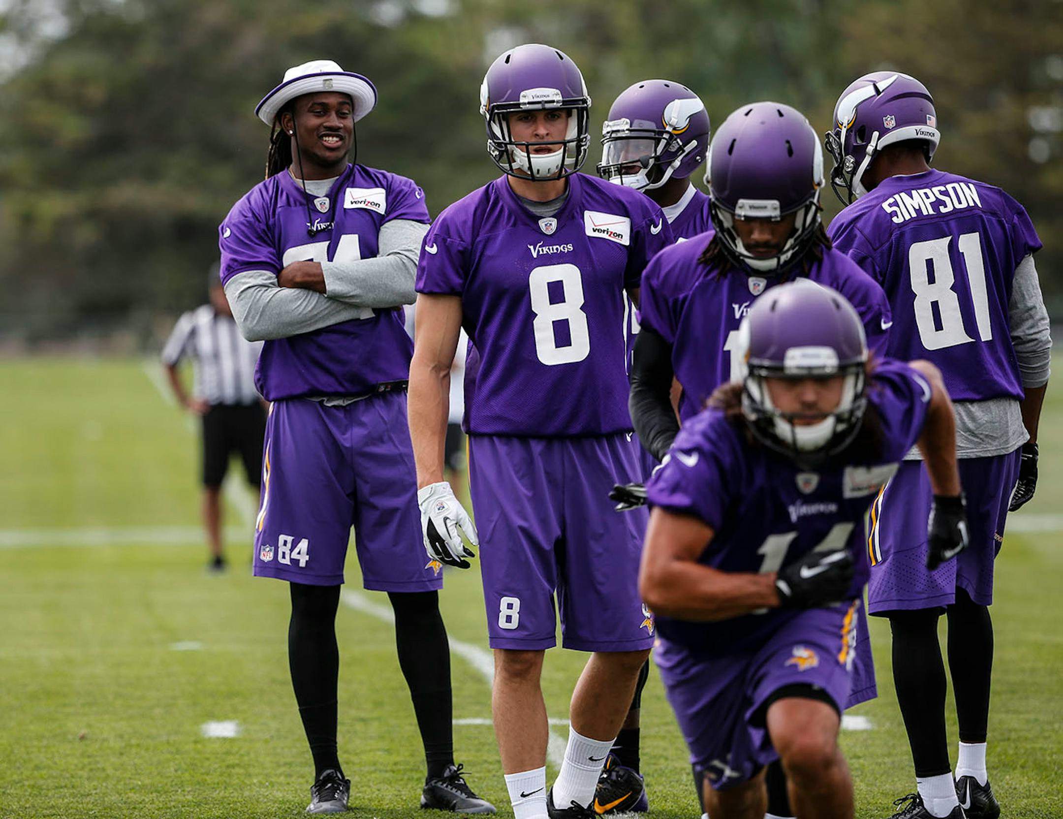 Minnesota Vikings receiver Cordarrelle Patterson, rear left, did not participate in drills during training camp Friday, July 24, 2014, at Minnesota State in Mankato, MN.