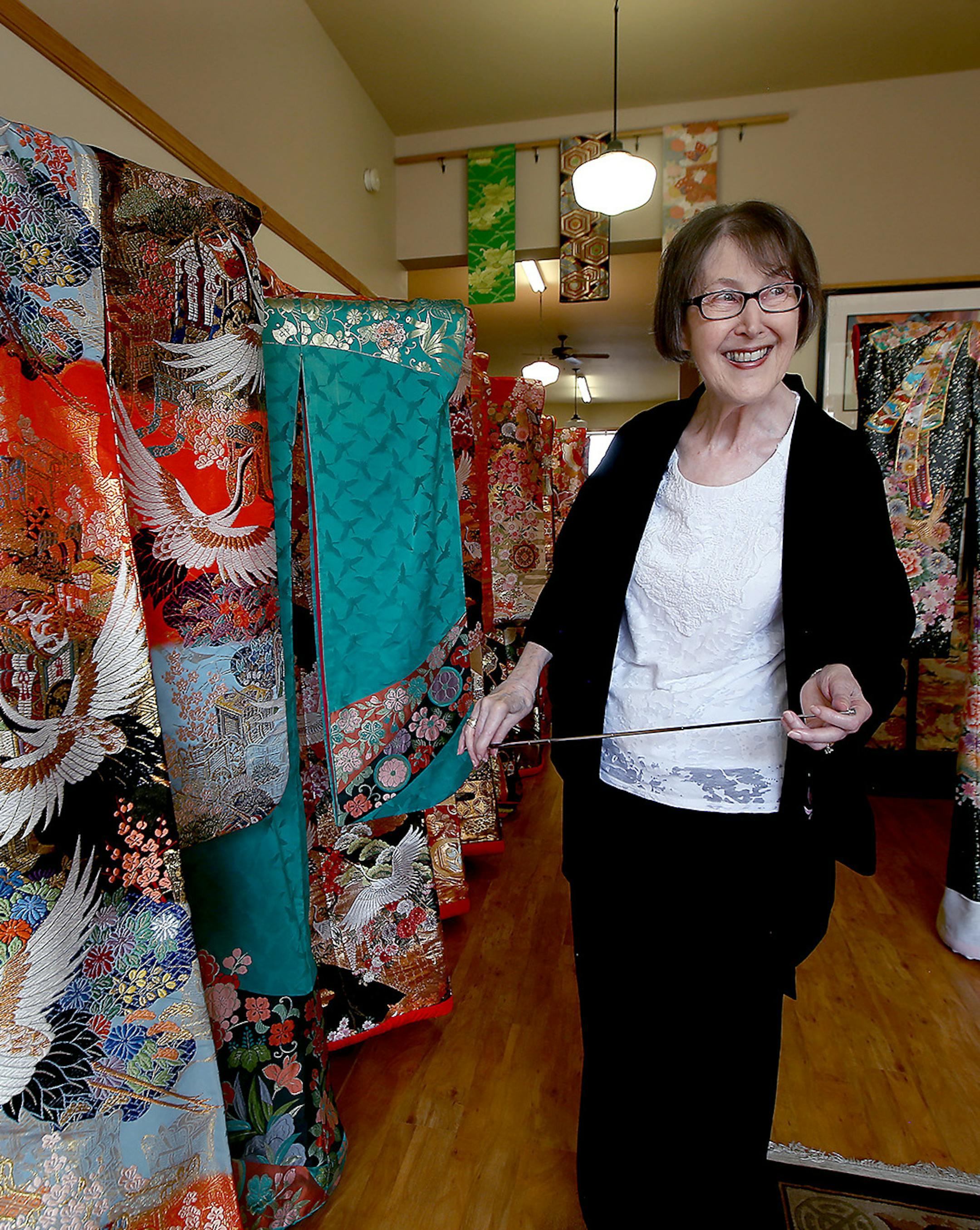 Jan Fuller showed off her collection of what may be the world’s largest collection of Japanese wedding kimono at her shop, in downtown Wabasha.