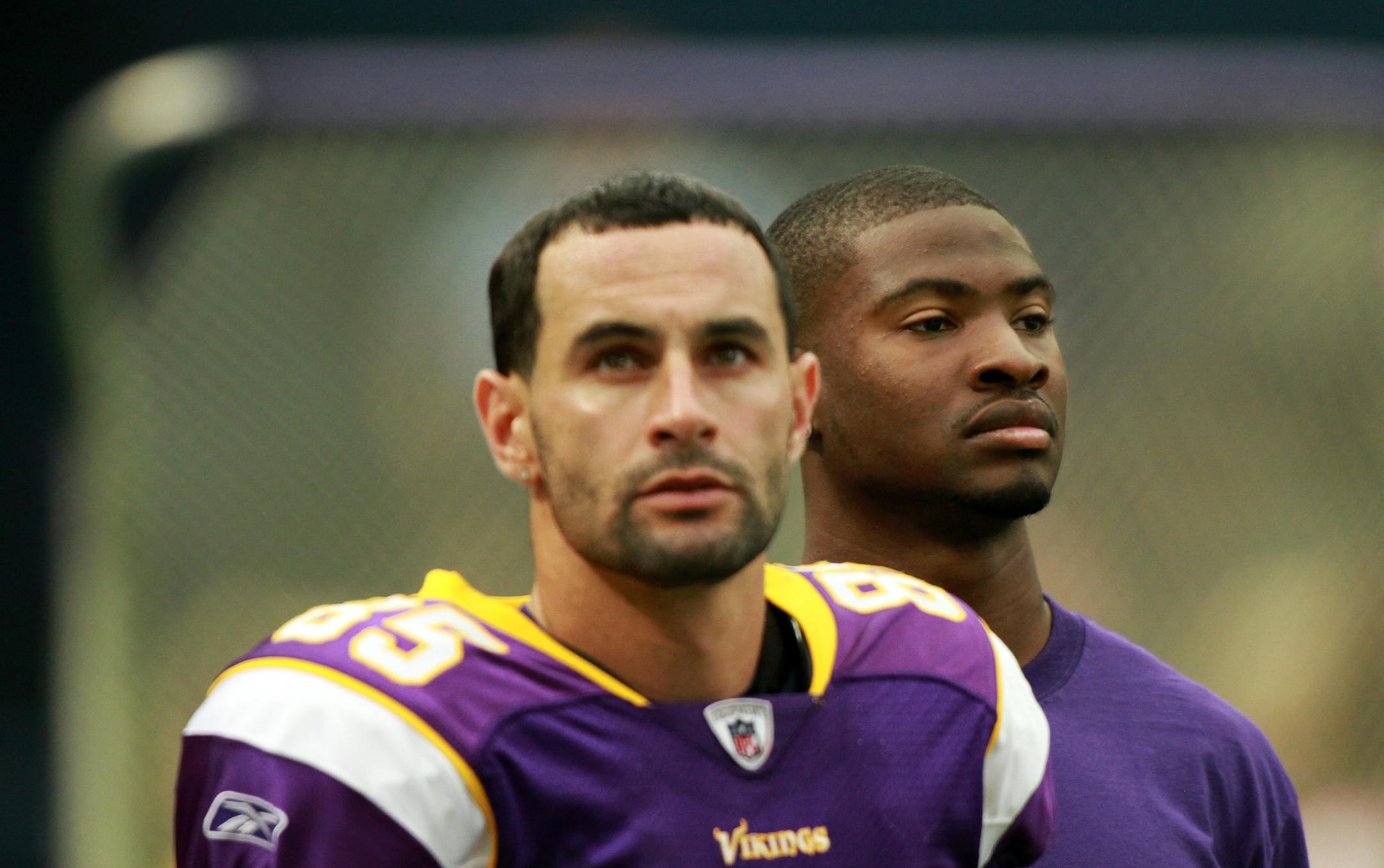 Vikings wide receiver Greg Camarillo watched a replay from the sidelines after Bernard Berrian (right) was deactivated at the start of the game against the Arizona Cardinals at Mall of America Field in Minneapolis, MN, on October 9, 2011.] (MCKENNA EWEN/STAR TRIBUNE) mckenna.ewen@startribune.com