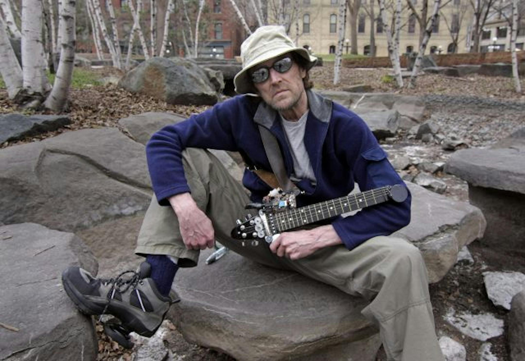 Musician Michael Yonkers, with a home- made instrument