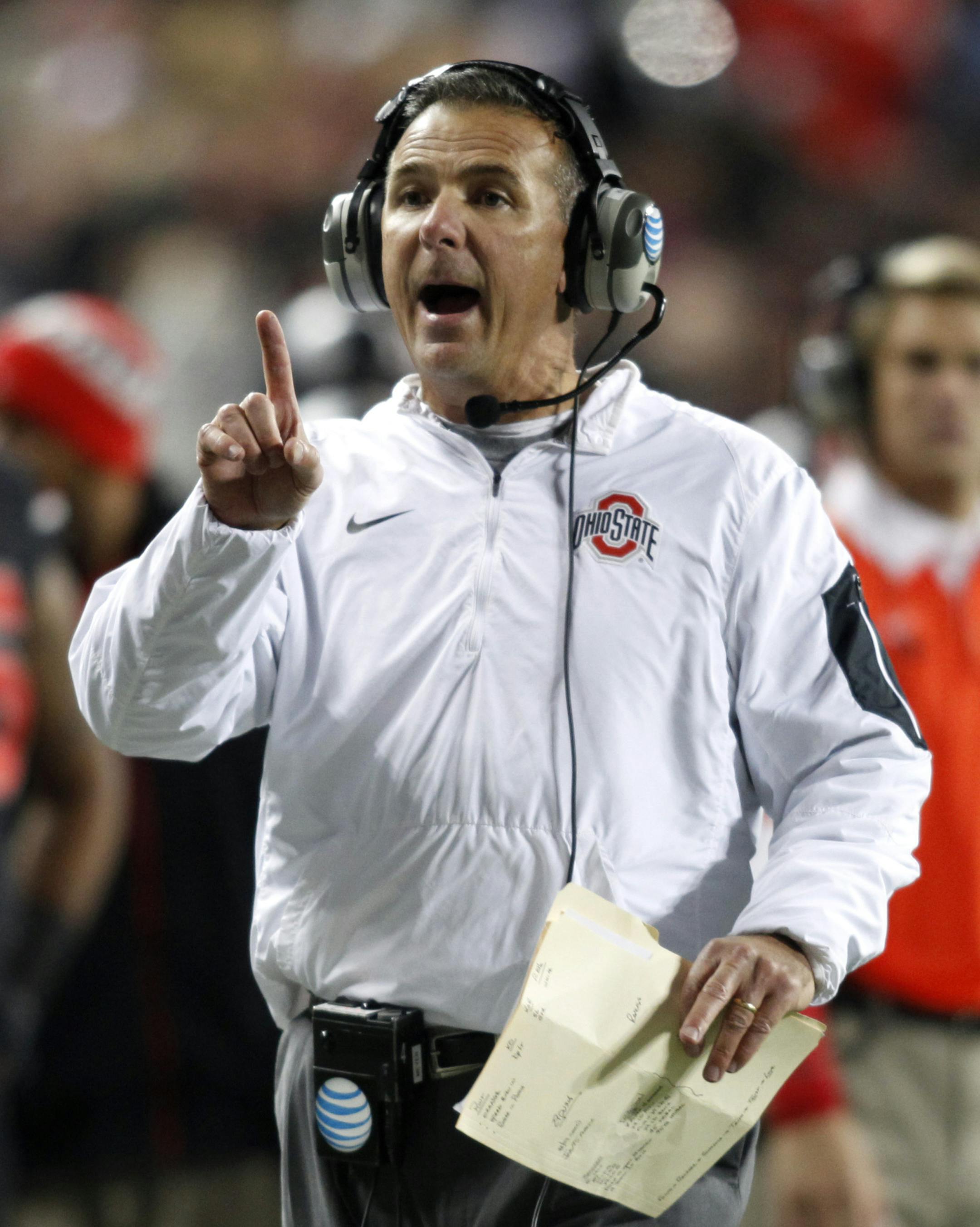 Ohio State coach Urban Meyer gestures during an NCAA college football game against Penn State Saturday, Oct. 17, 2015, in Columbus, Ohio. Ohio State beat Penn State 38-10. (AP Photo/Paul Vernon)