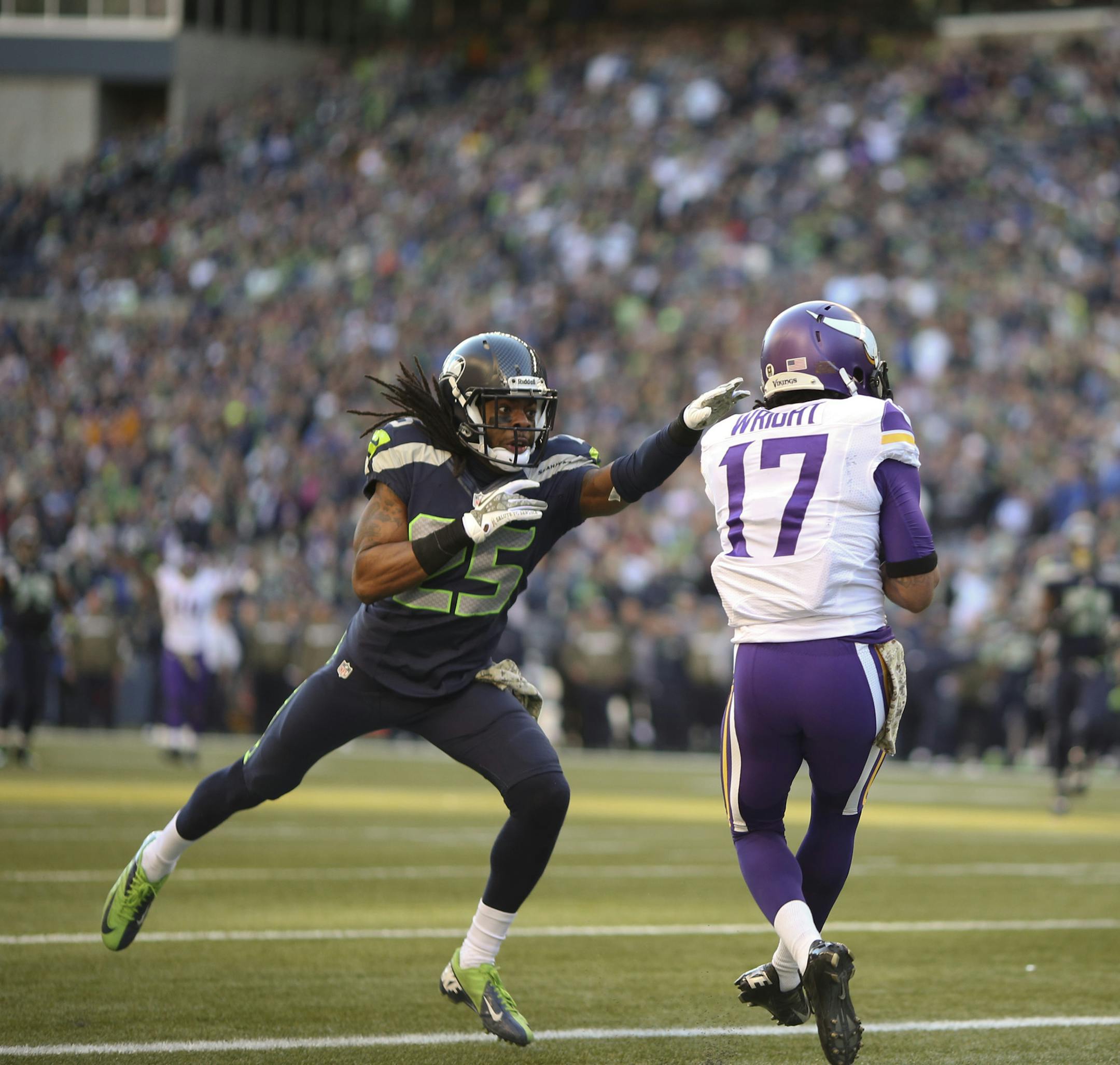 The Minnesota Vikings faced the Seattle Seahawks in an NFL game Sunday afternoon, November 17, 2013 at CenturyLink Field in Seattle. Minnesota Vikings wide receiver Jarius Wright (17) beat Seattle Seahawks cornerback Richard Sherman (25) for a 38 yard touchdown reception in the second quarter. ] JEFF WHEELER &#x201a;&#xc4;&#xa2; jeff.wheeler@startribune.com ORG XMIT: MIN1311171637122502
