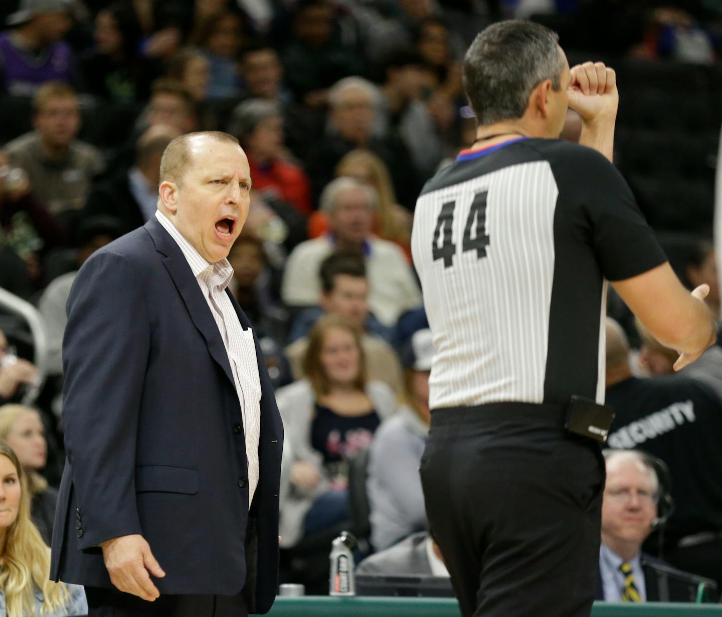 Minnesota Timberwolves Tom Thibodeau, left, argues a call during the second half of an NBA preseason basketball game against the Milwaukee Bucks, Friday, Oct. 12, 2018, in Milwaukee. (AP Photo/Mike Roemer)