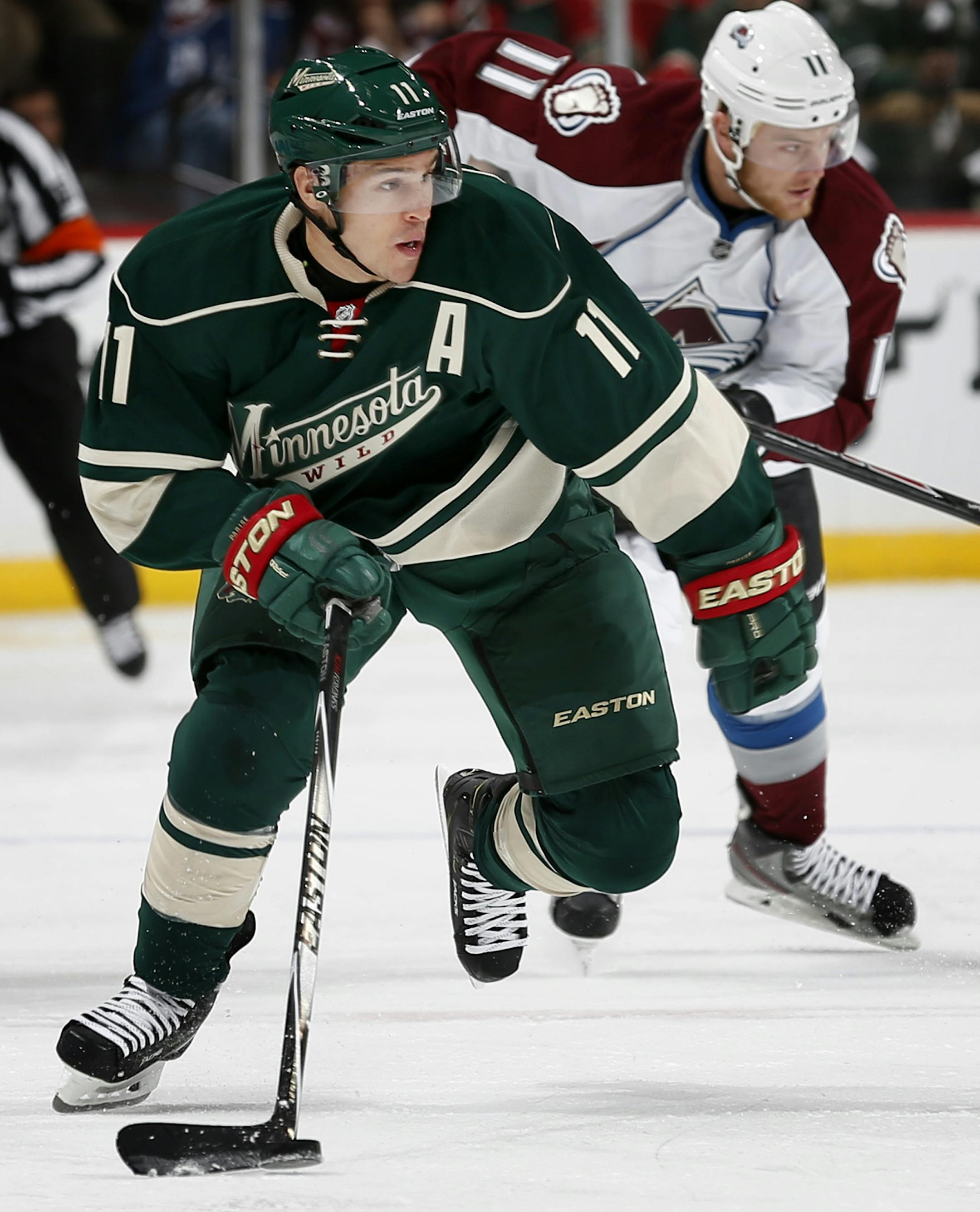 Zach Parise (11) skated up the ice in the first period. ] CARLOS GONZALEZ cgonzalez@startribune.com - October 9, 2014 , St. Paul, Minn., Xcel Energy Center, NHL, Minnesota Wild vs. Colorado Avalanche Season opener